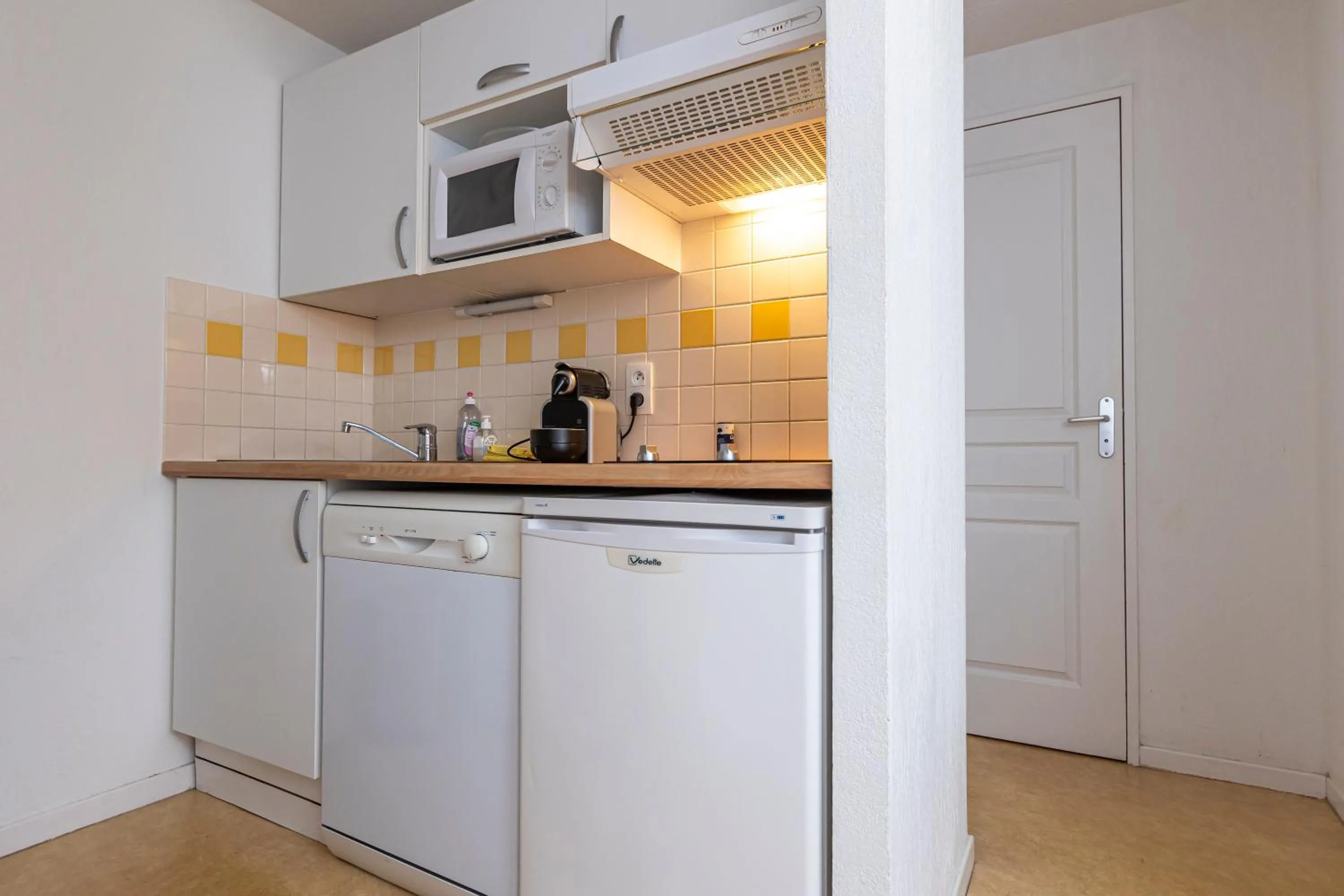 Kitchen or kitchenette in Résidence Odalys Soleil d'Aure