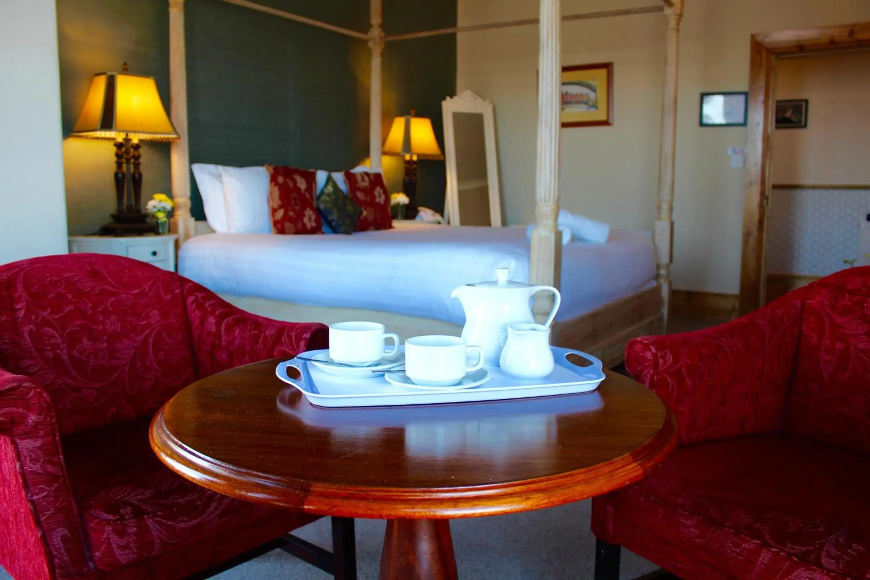 Deluxe Double Room with Four Poster Bed with Sea View in Royal Valentia Hotel Deluxe Double Room with Four Poster Bed with Sea View in Royal Valentia Hotel