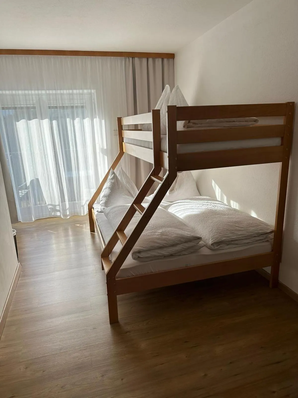 Photo of the whole room, Bed in Pension Alpina