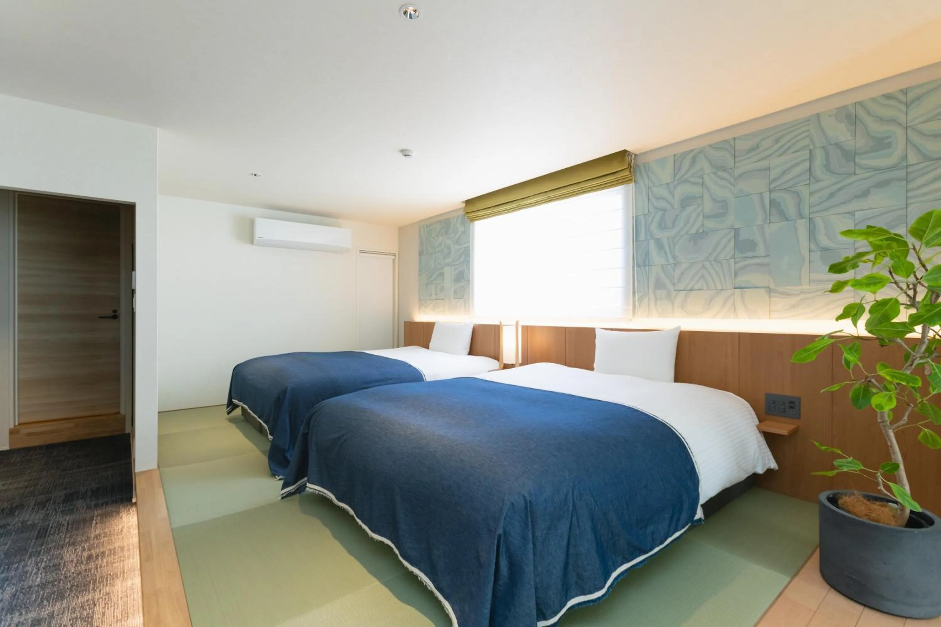 Bed in Nagi Kurashiki Hotel&Lounge
