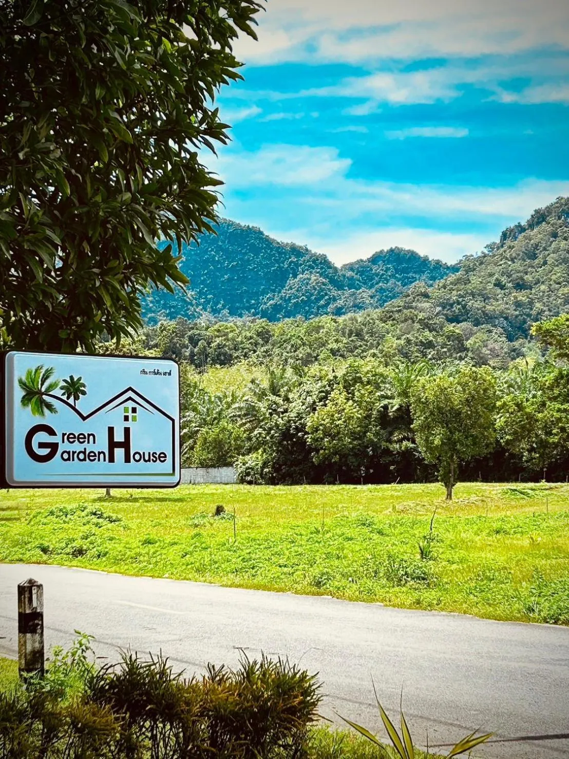 Property logo or sign in Green Garden House