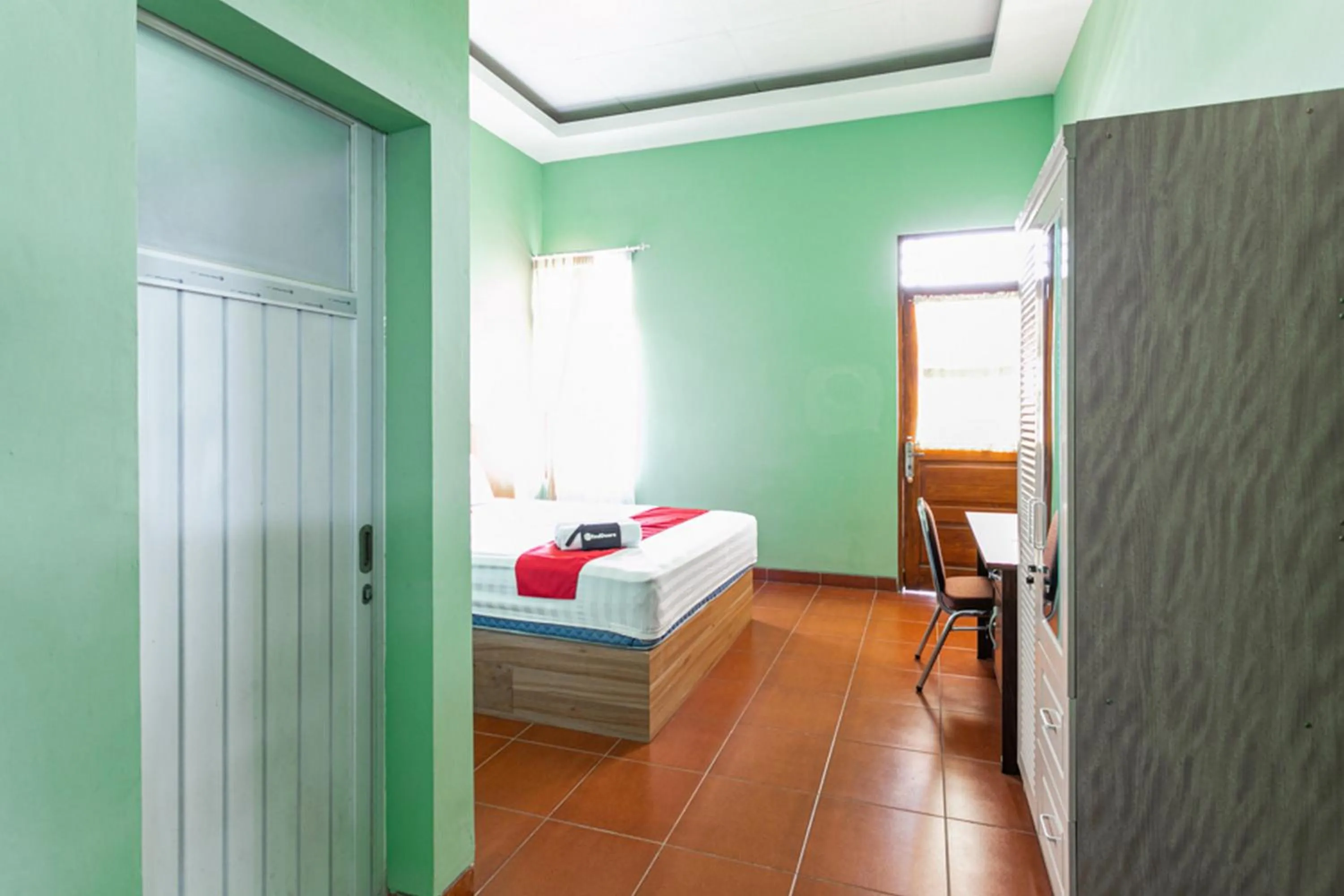 Bed in RedDoorz near Puro Mangkunegaran