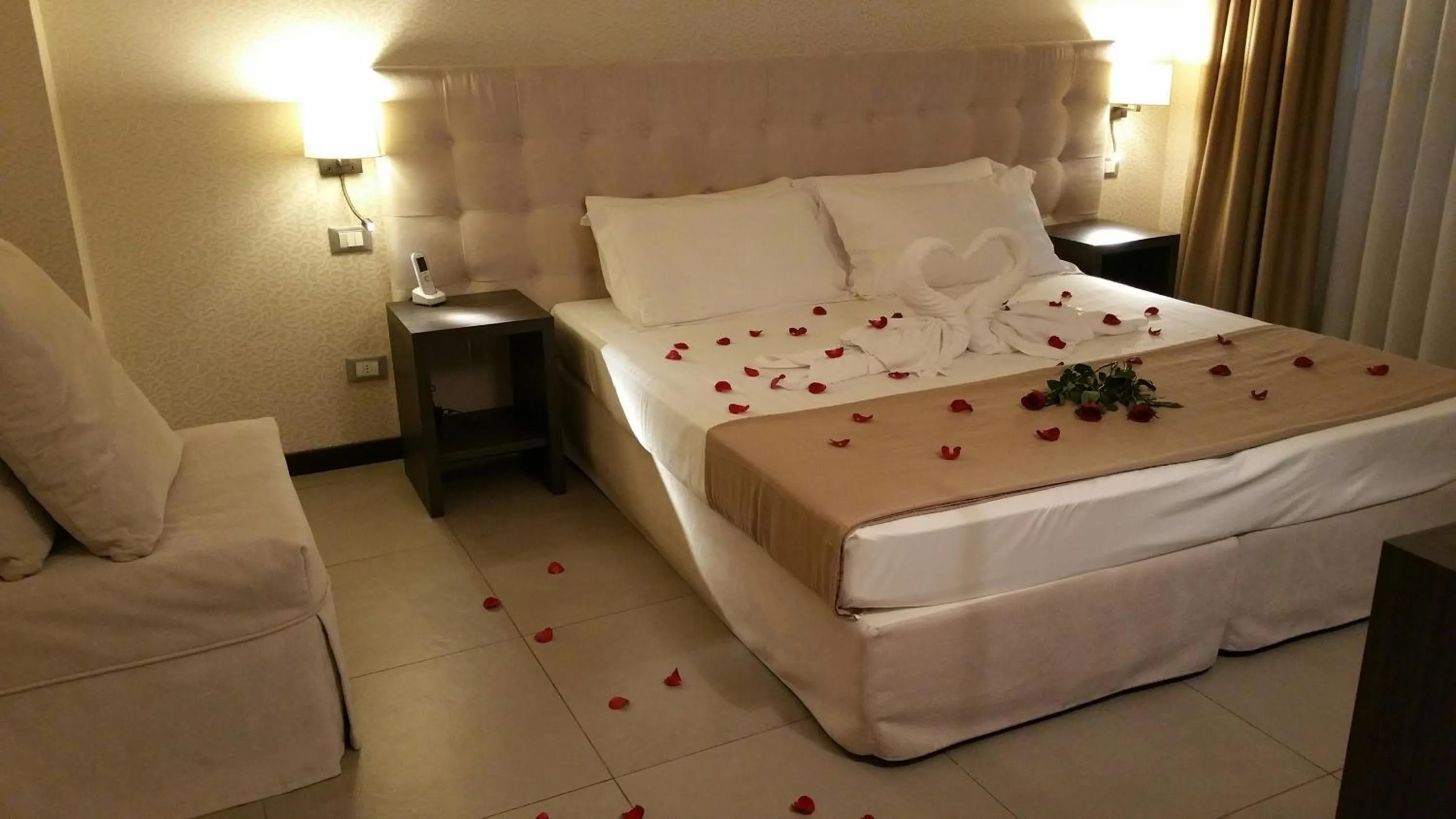 Decorative detail, Bed in HLL Hotel Lungolago Lecco-Como Lake