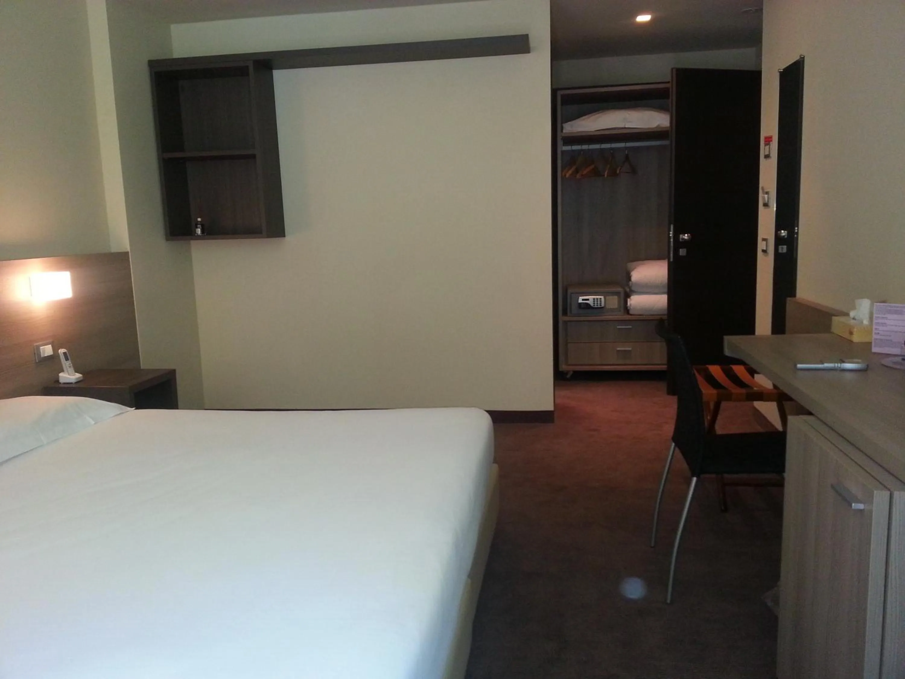 Decorative detail, Bed in HLL Hotel Lungolago Lecco-Como Lake