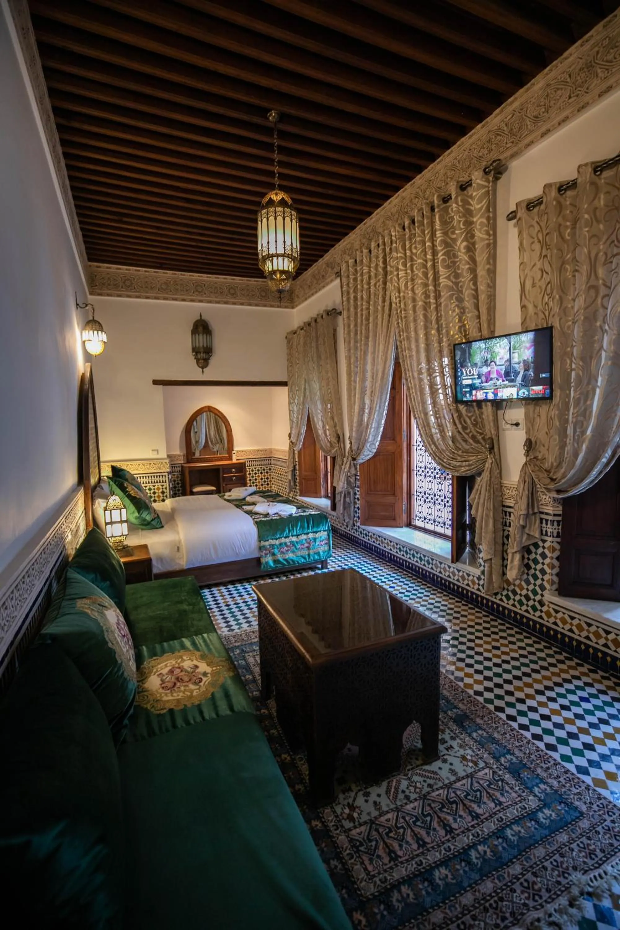 Seating area, Bed in Riad Sidrat Fes