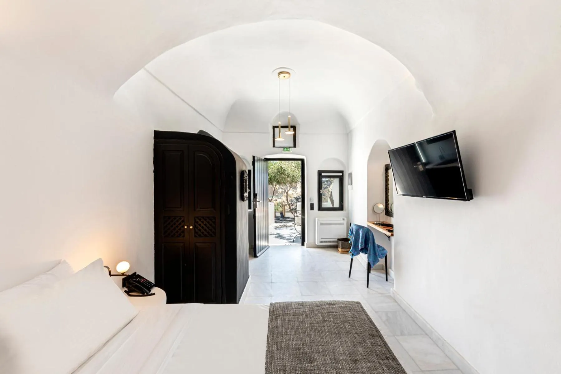 Photo of the whole room, Bed in Pearl of Caldera Oia - Boutique Hotel by Pearl Hotel Collection