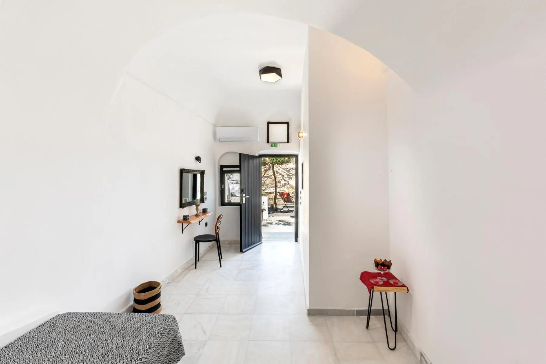 Photo of the whole room, Bed in Pearl of Caldera Oia - Boutique Hotel by Pearl Hotel Collection