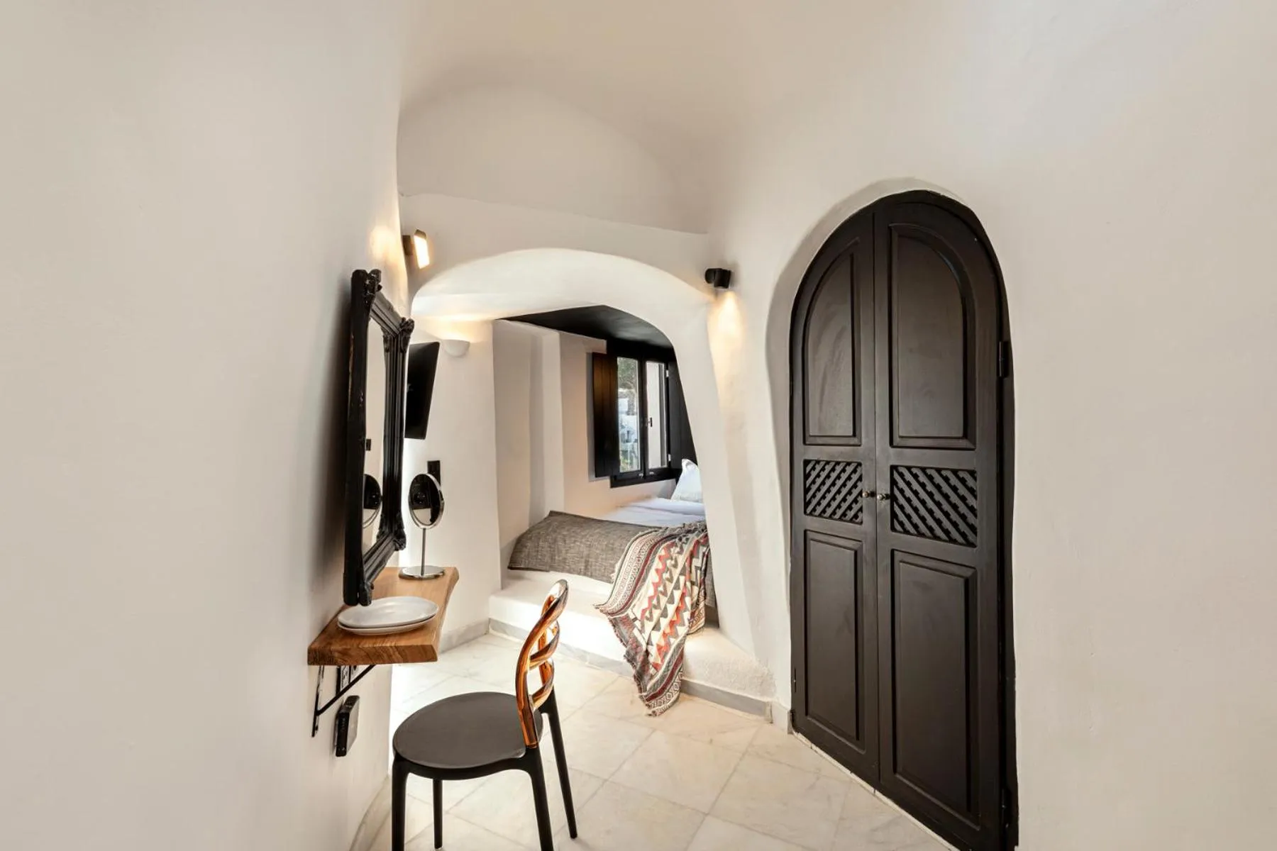 Photo of the whole room in Pearl of Caldera Oia - Boutique Hotel by Pearl Hotel Collection