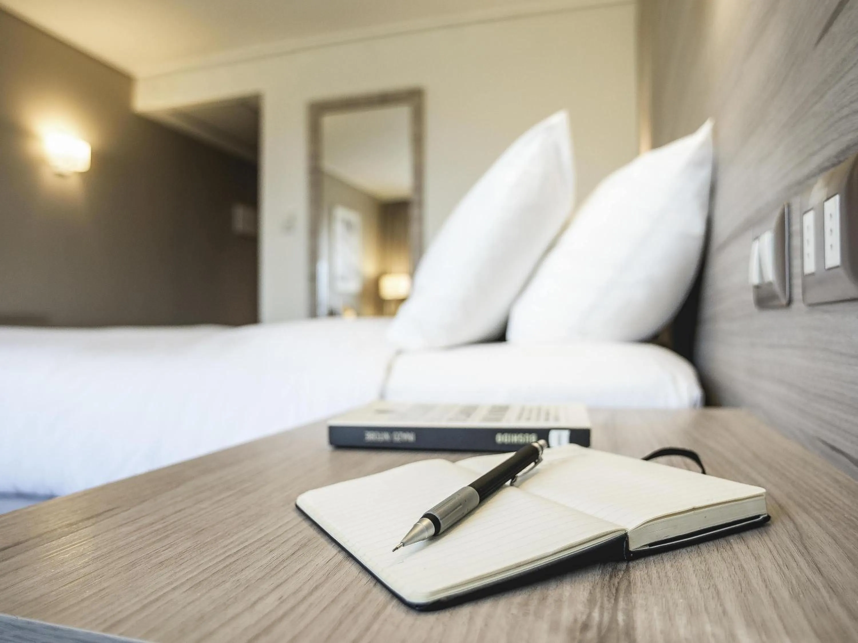 Bedroom in Pullman Doha West Bay