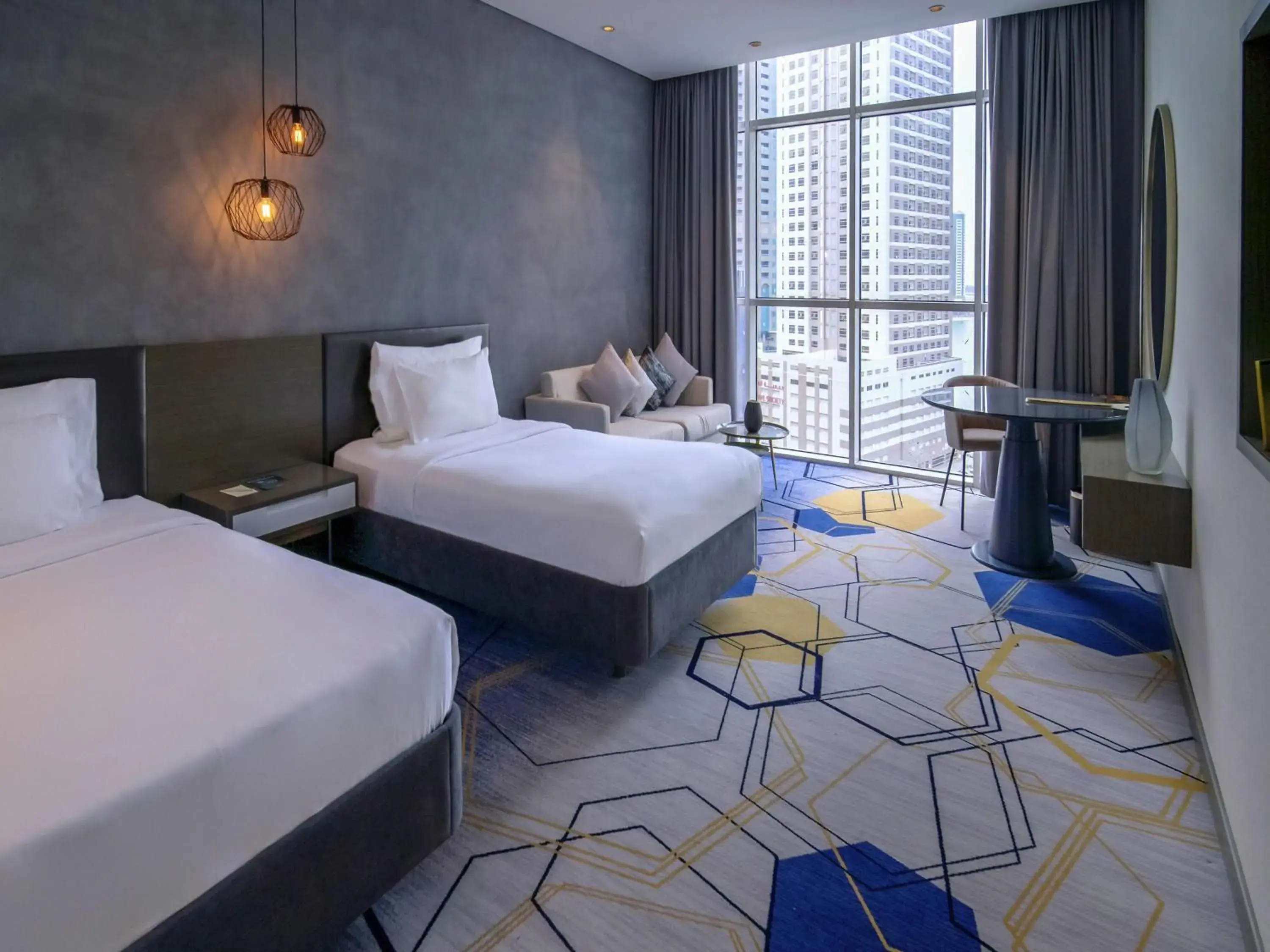Superior Twin Room with City View in Pullman Sharjah Superior Twin Room with City View in Pullman Sharjah