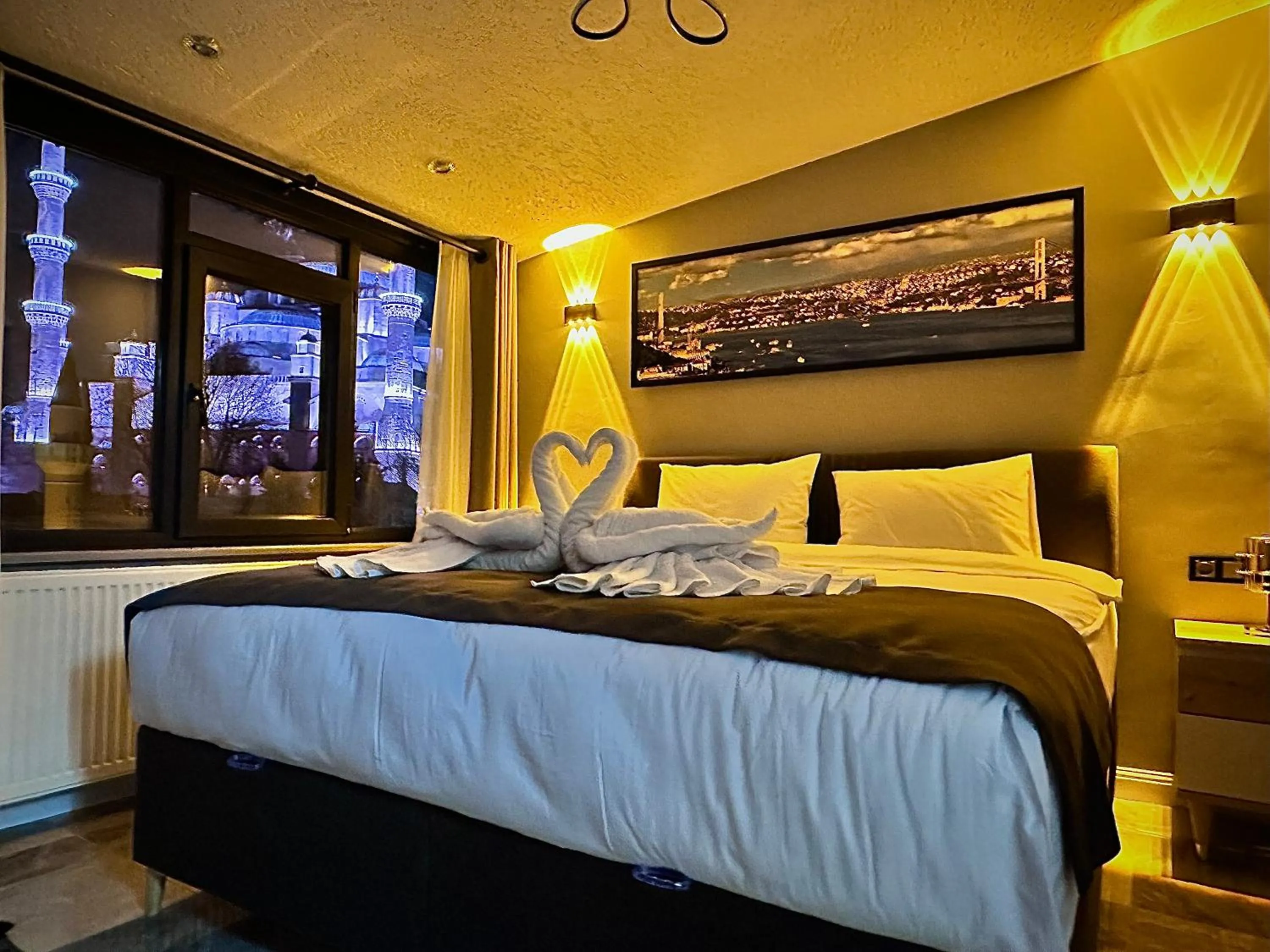 Photo of the whole room, Bed in Stone Suites