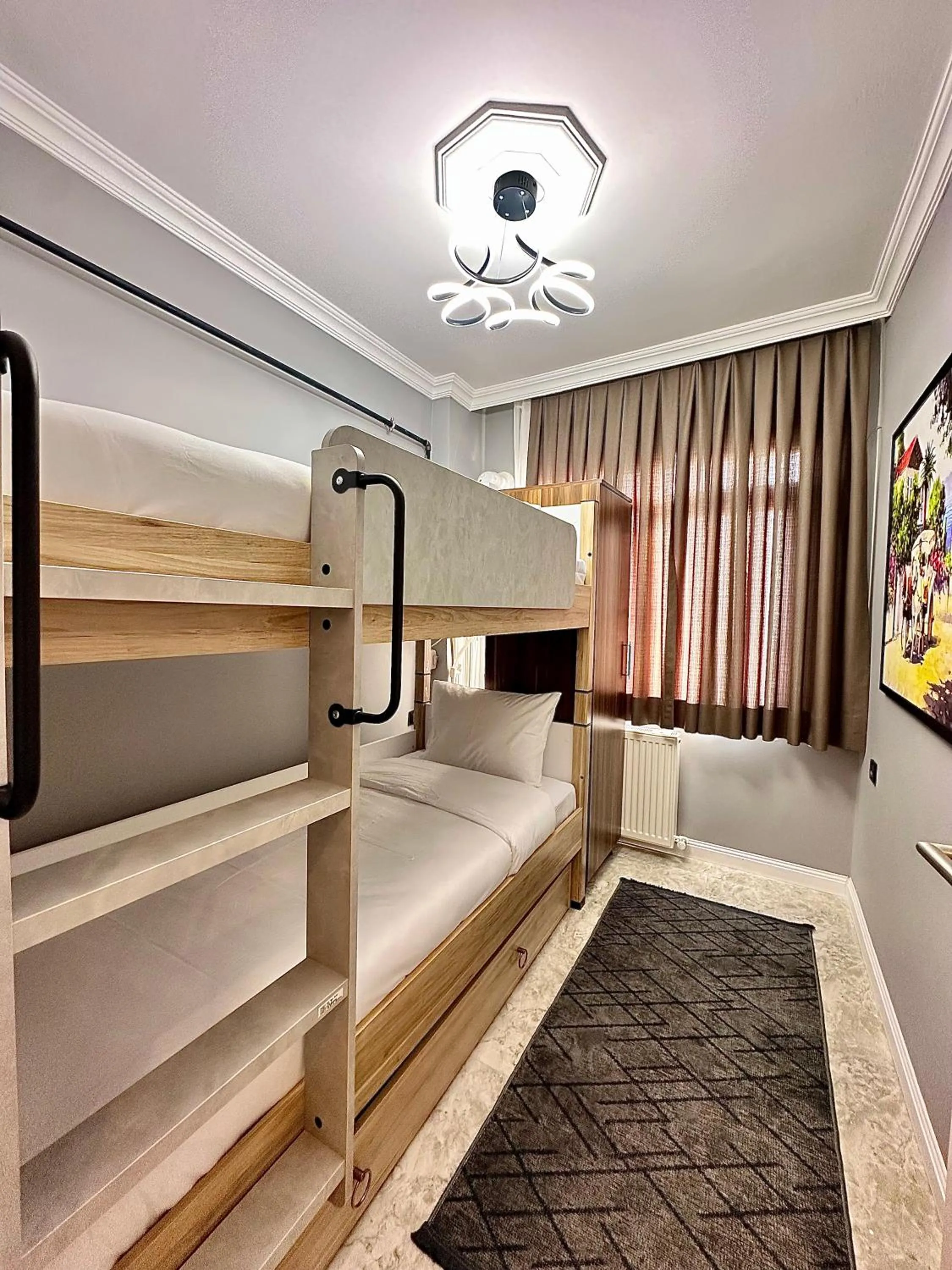 Photo of the whole room, Bed in Stone Suites