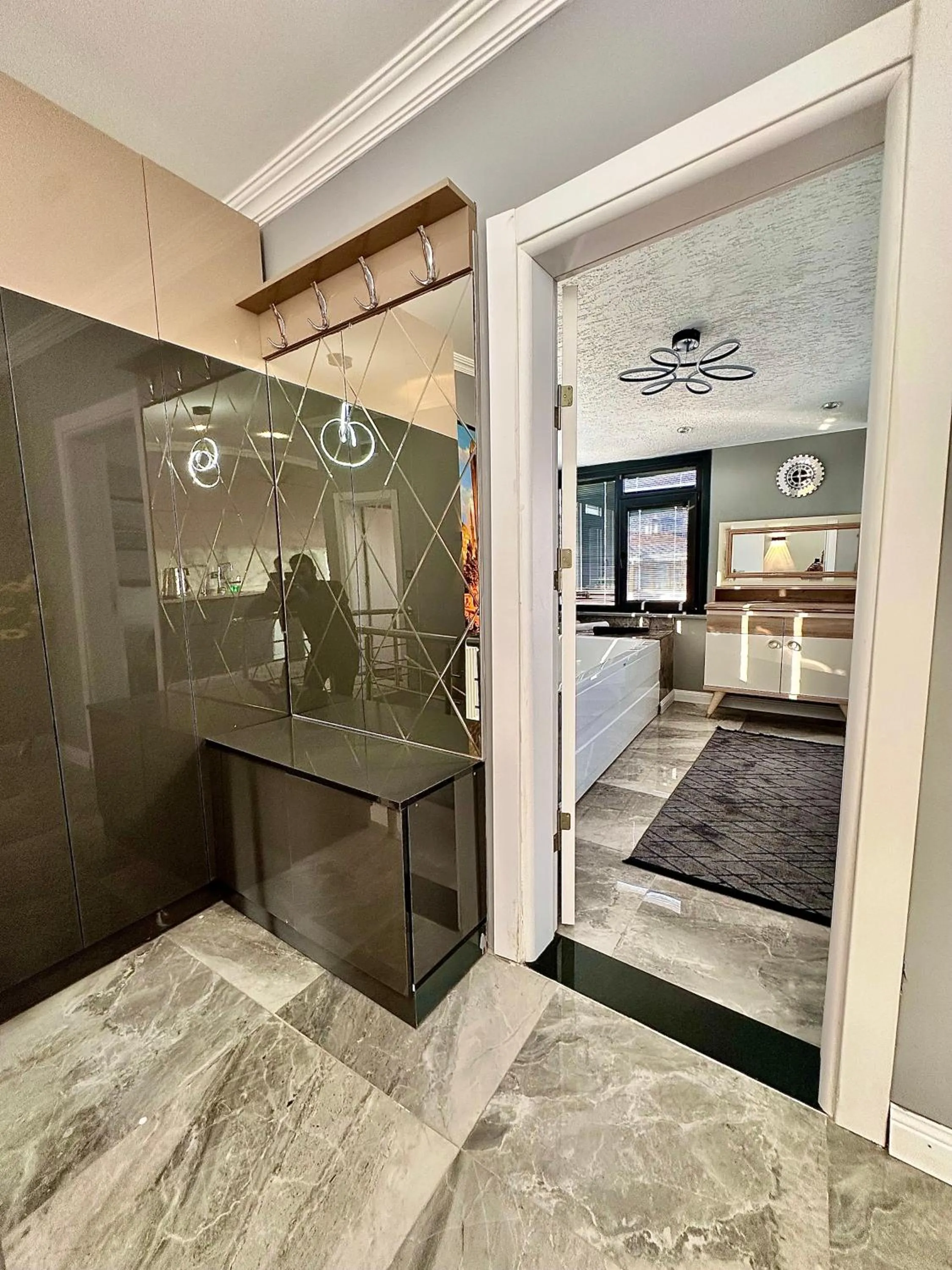 Photo of the whole room, Bed in Stone Suites