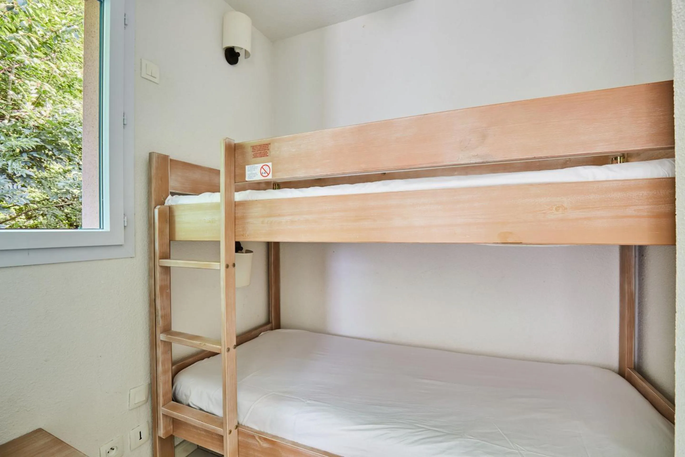 Bed in Résidence Odalys Le Hameau du Lac