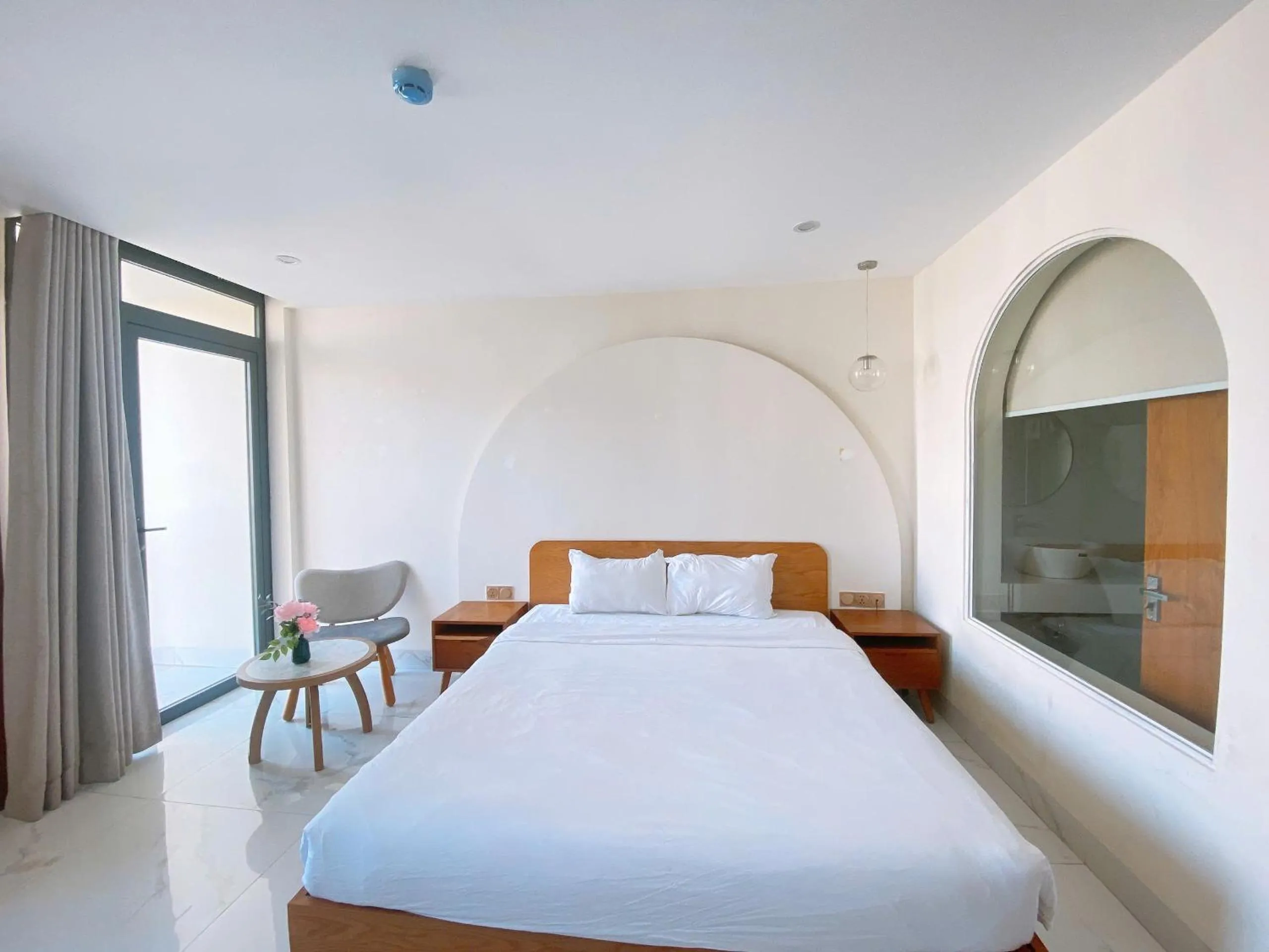 Bed in Maple Suite Hotel & Apartment