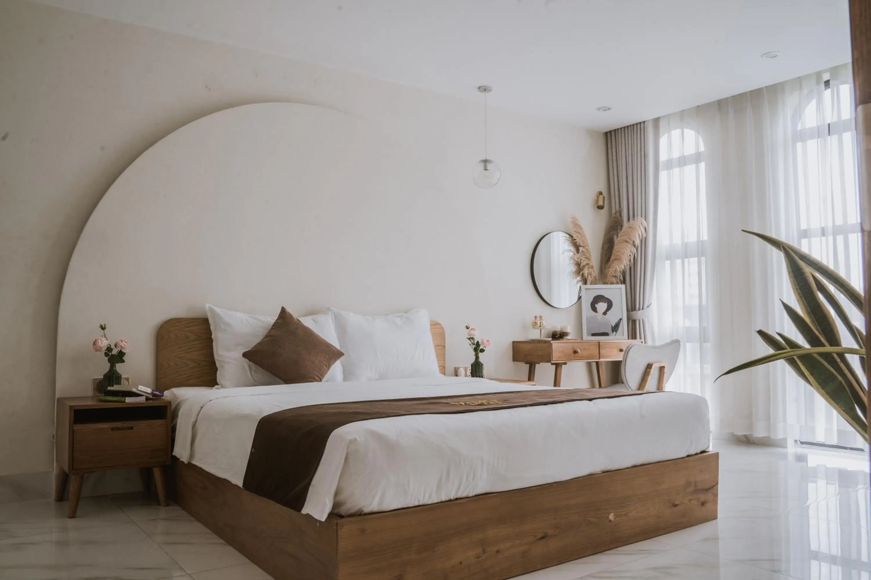 Bed in Maple Suite Hotel & Apartment