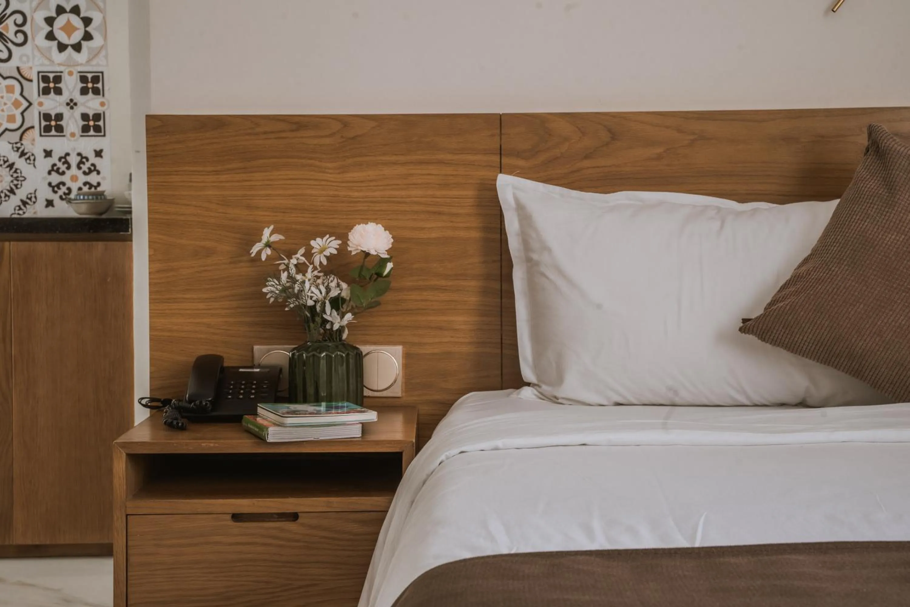 Bed in Maple Suite Hotel & Apartment