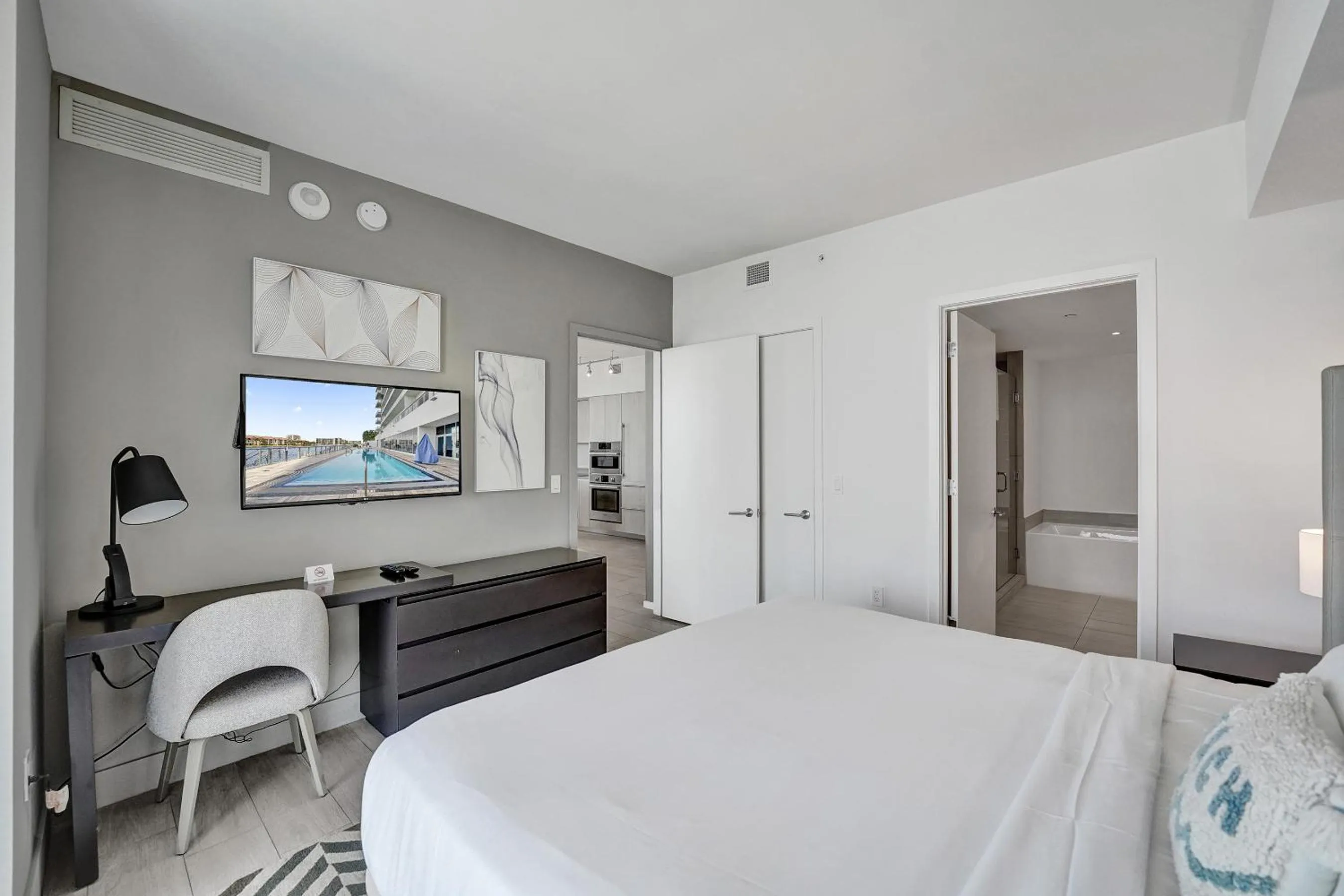 Bed in Amazing Apartments at H Beach House