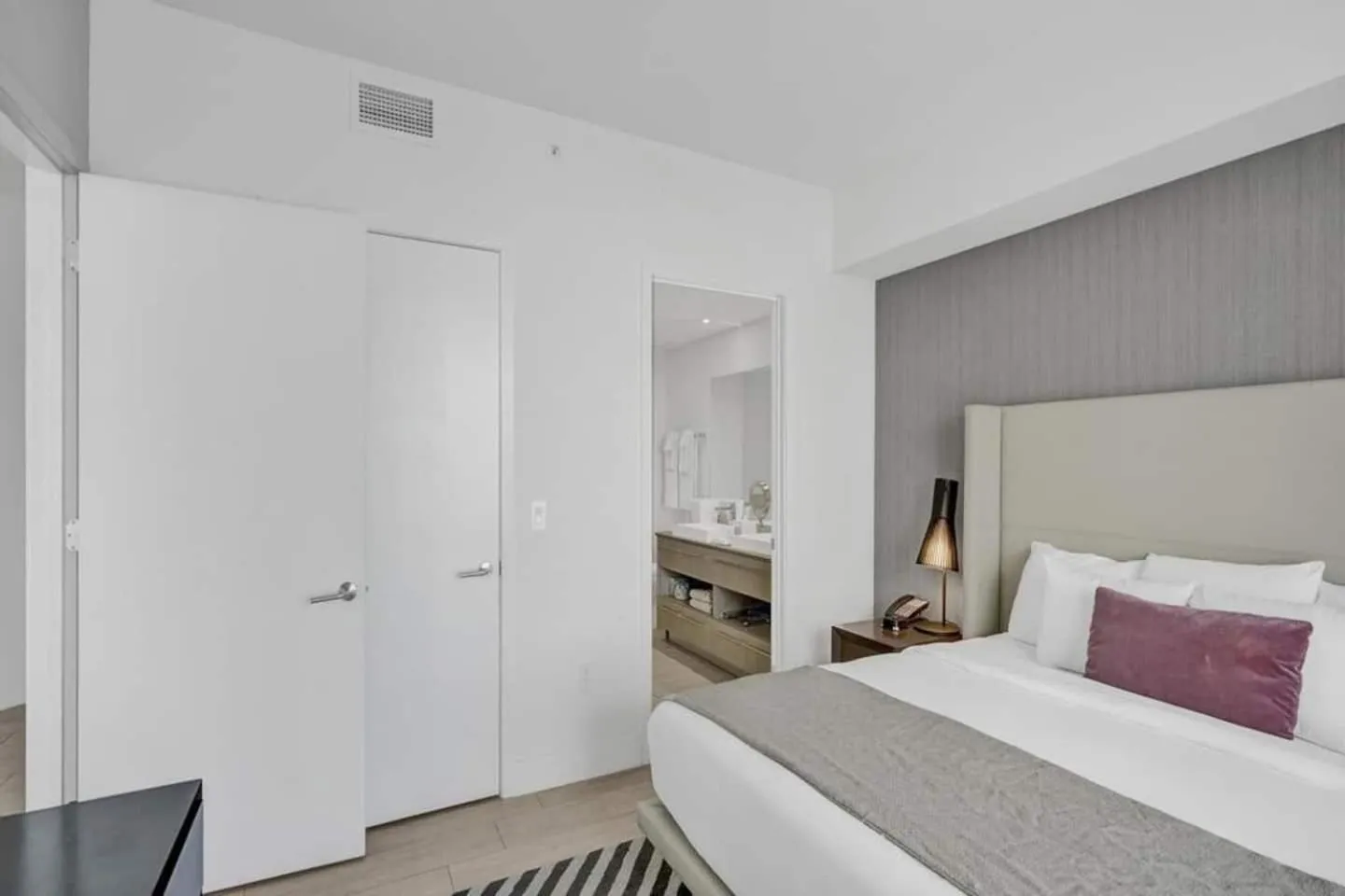 Bed in Amazing Apartments at H Beach House