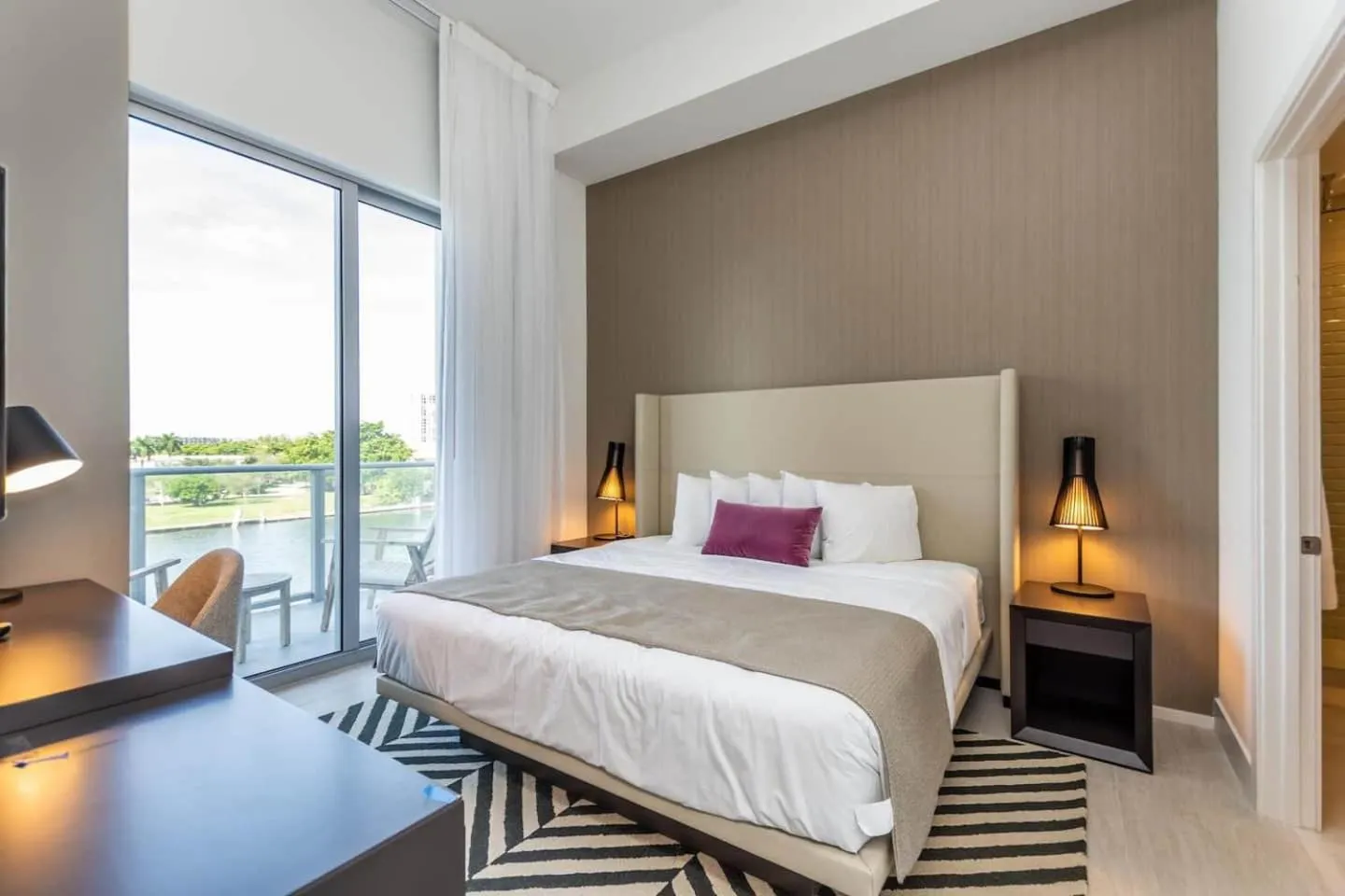 Bed in Amazing Apartments at H Beach House