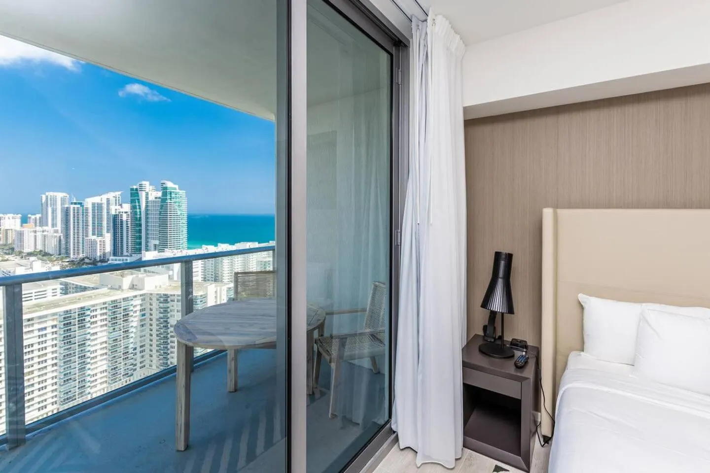 Bed in Amazing Apartments at H Beach House