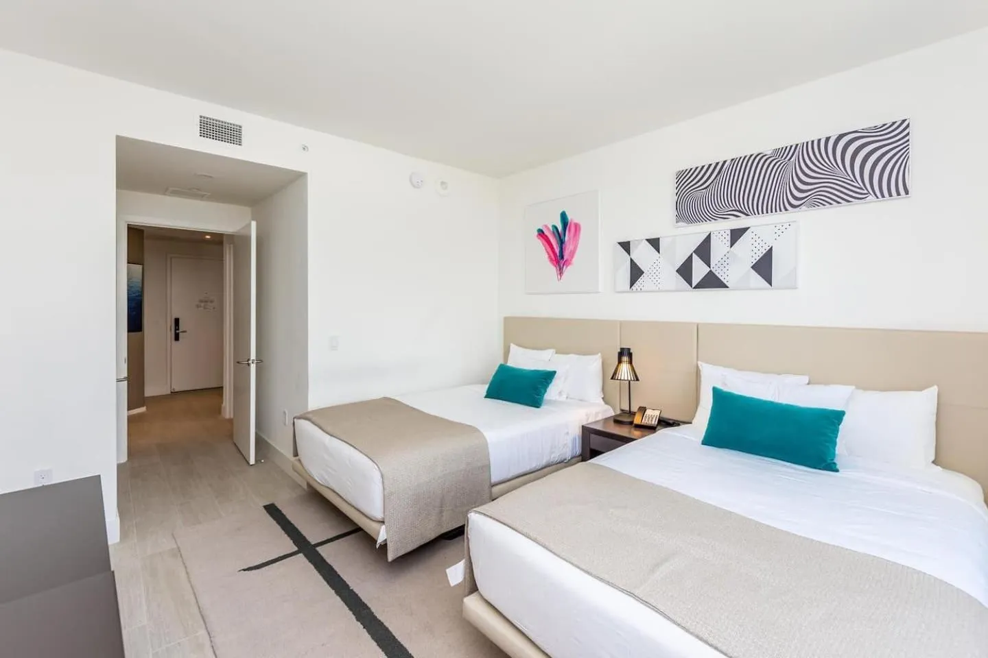 Bed in Amazing Apartments at H Beach House