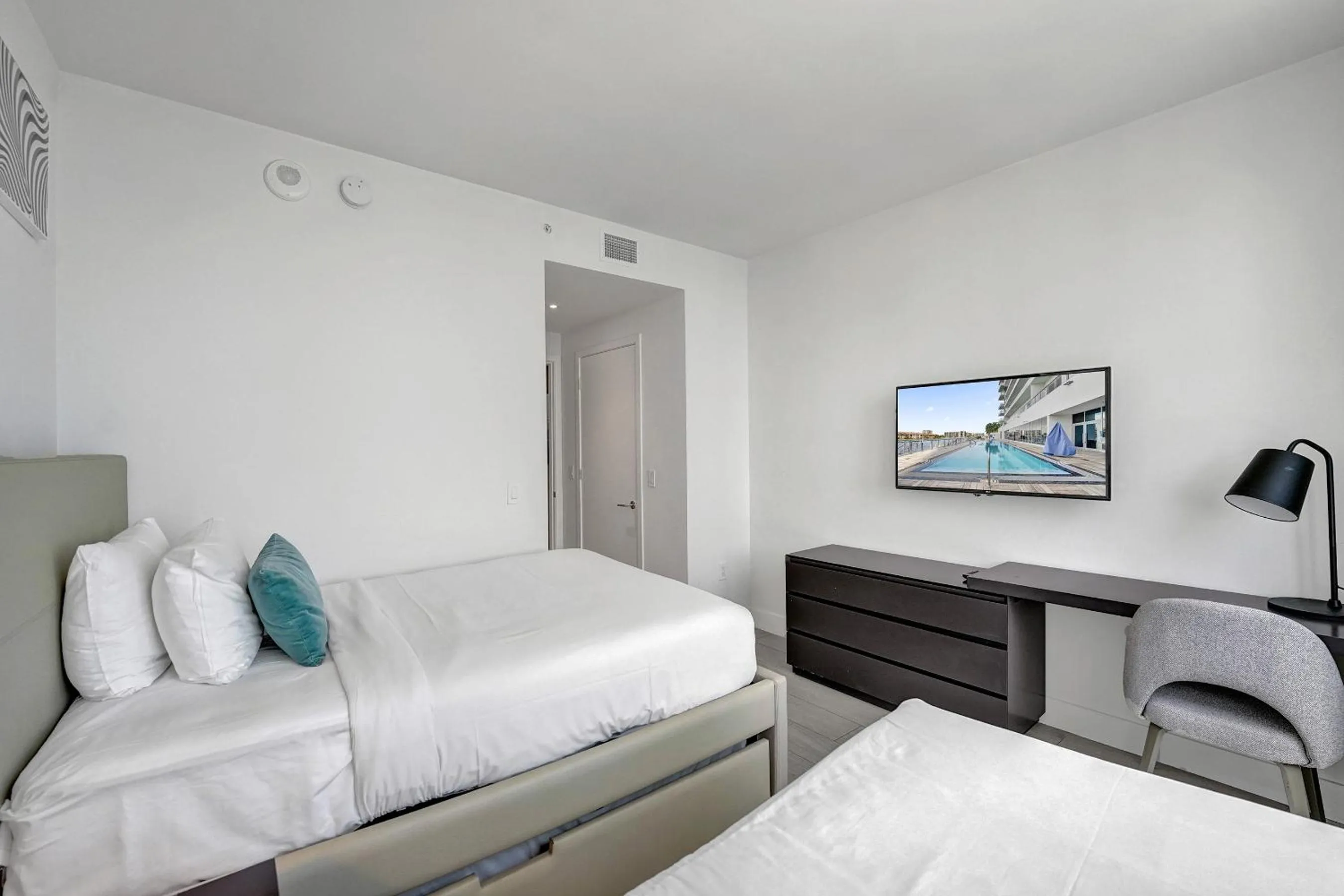 Bed in Amazing Apartments at H Beach House