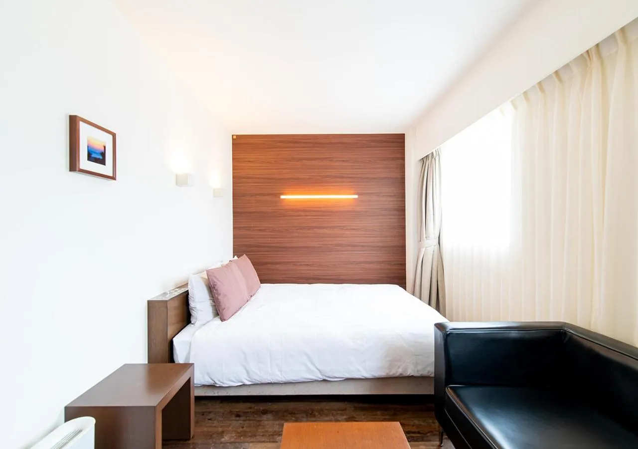 Photo of the whole room, Bed in Hotel day by day