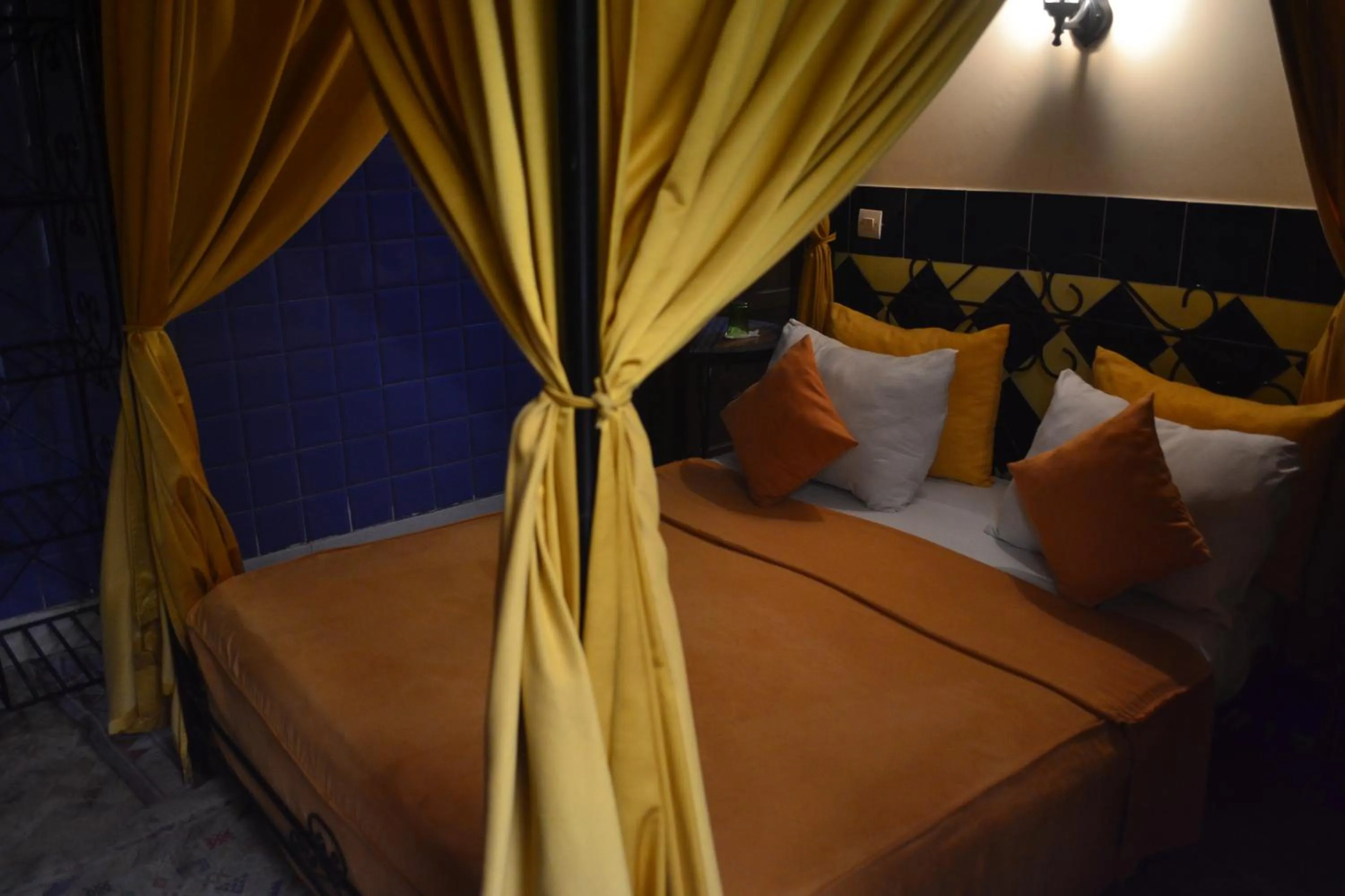 Bed in Riad Hôtel Belleville Marrakech