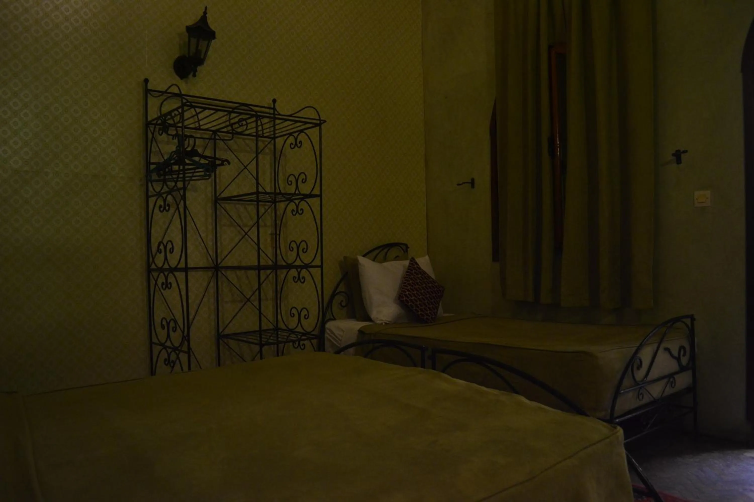 Bed in Riad Hôtel Belleville Marrakech