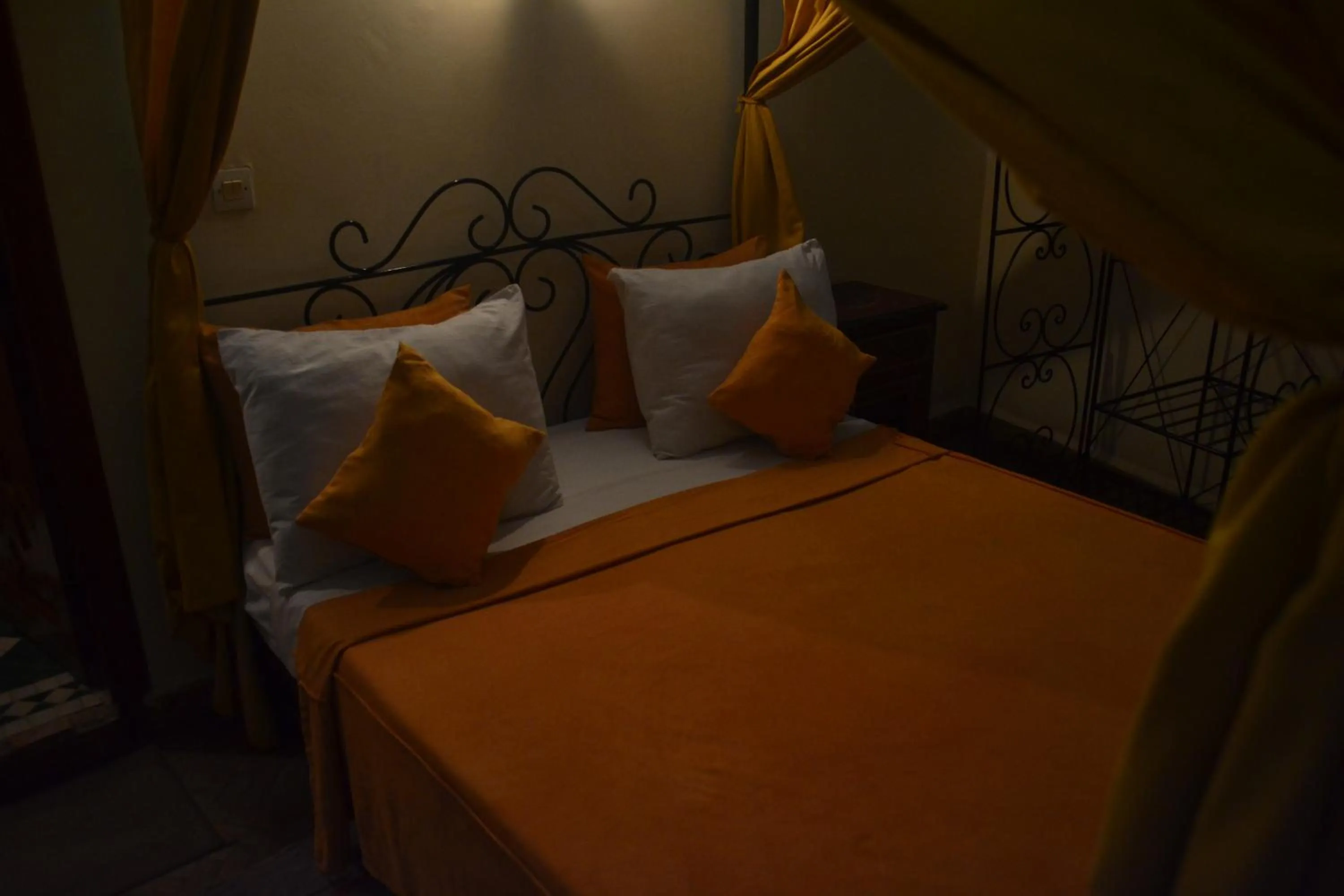 Bed in Riad Hôtel Belleville Marrakech