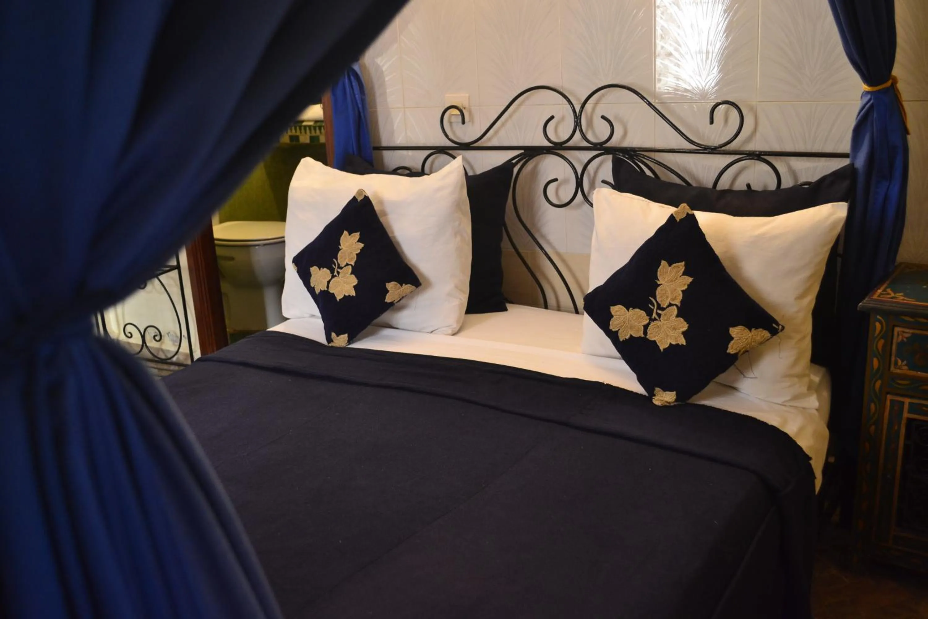 Bed in Riad Hôtel Belleville Marrakech