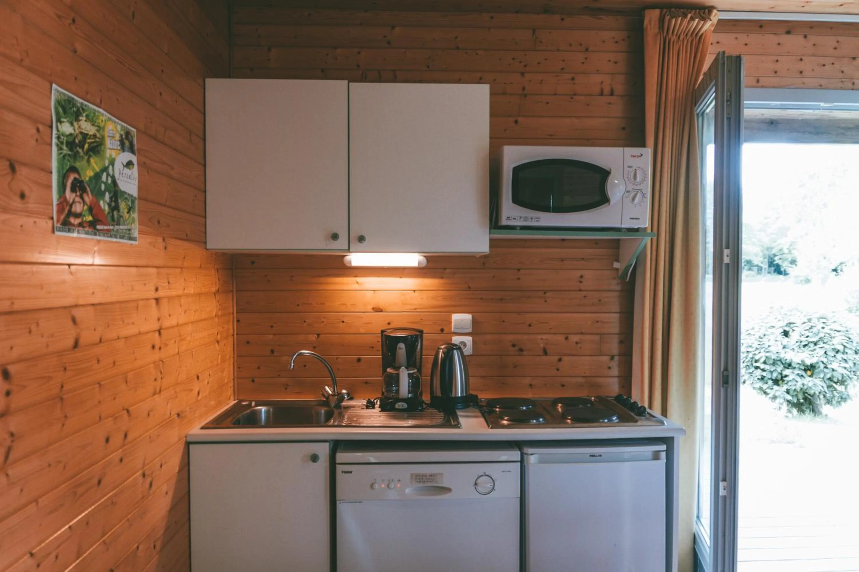 Kitchen or kitchenette in Terres de France - Natura Resort Pescalis