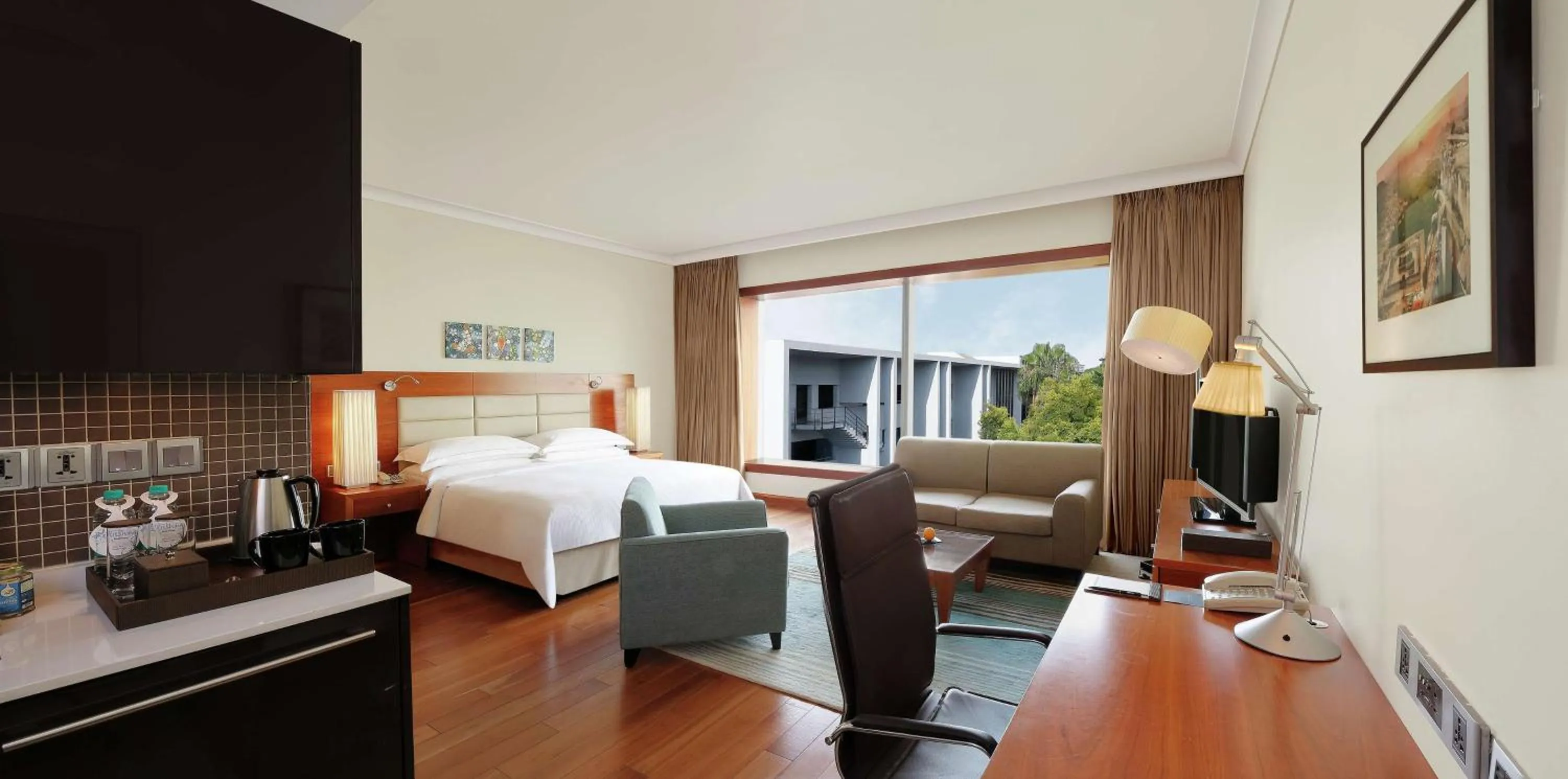 View (from property/room), Bed in Hilton Bangalore Embassy GolfLinks