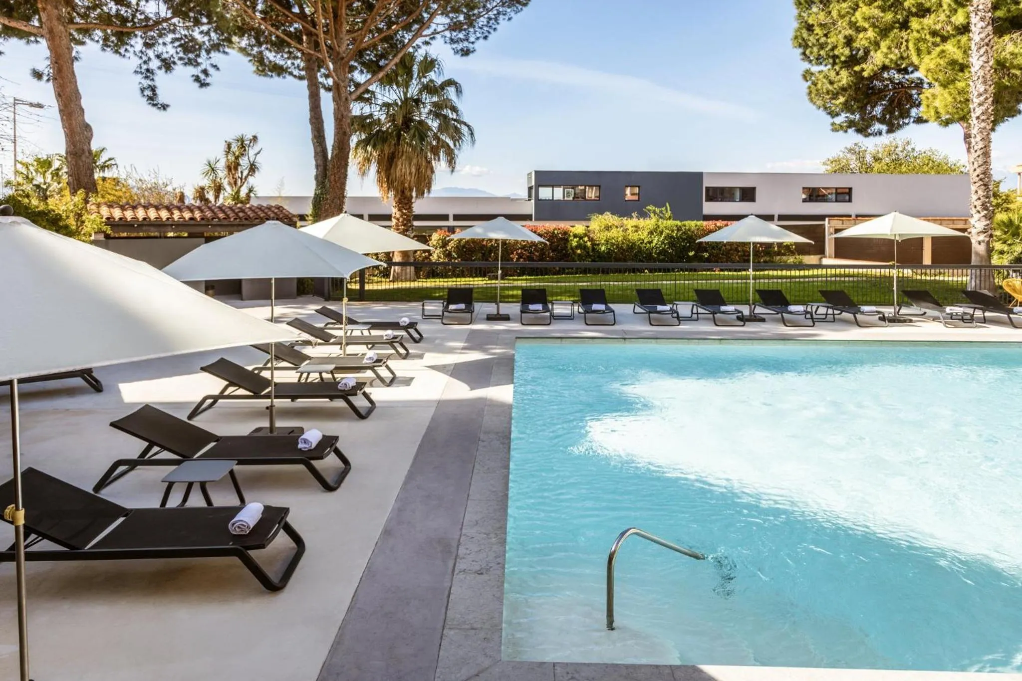 Swimming pool in Holiday Inn Perpignan by IHG