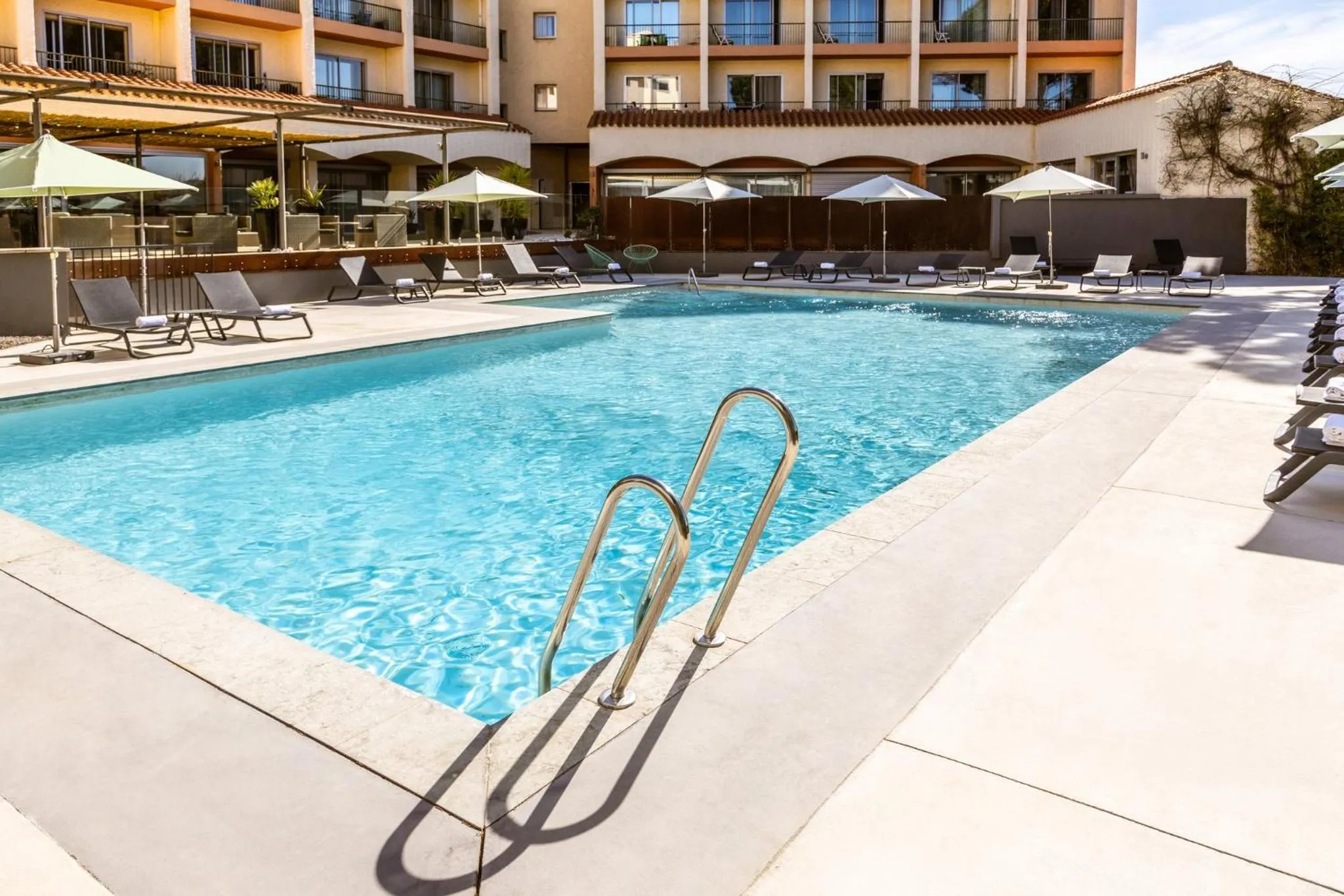 Swimming pool in Holiday Inn Perpignan by IHG