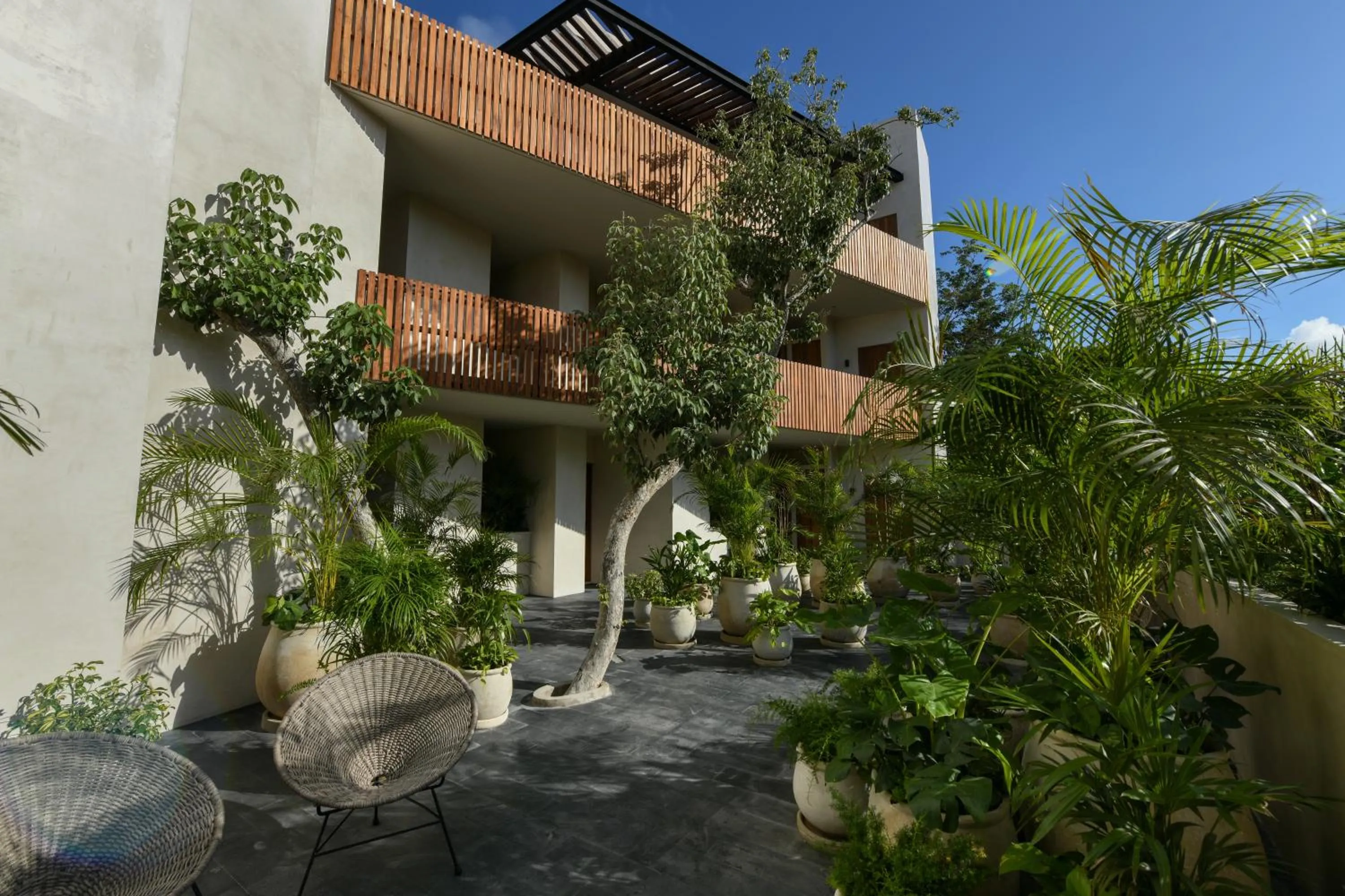 Property building in Casa Agape Hotel Tulum with Beach Club Access