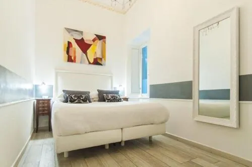 Bed in Ripetta Rooms