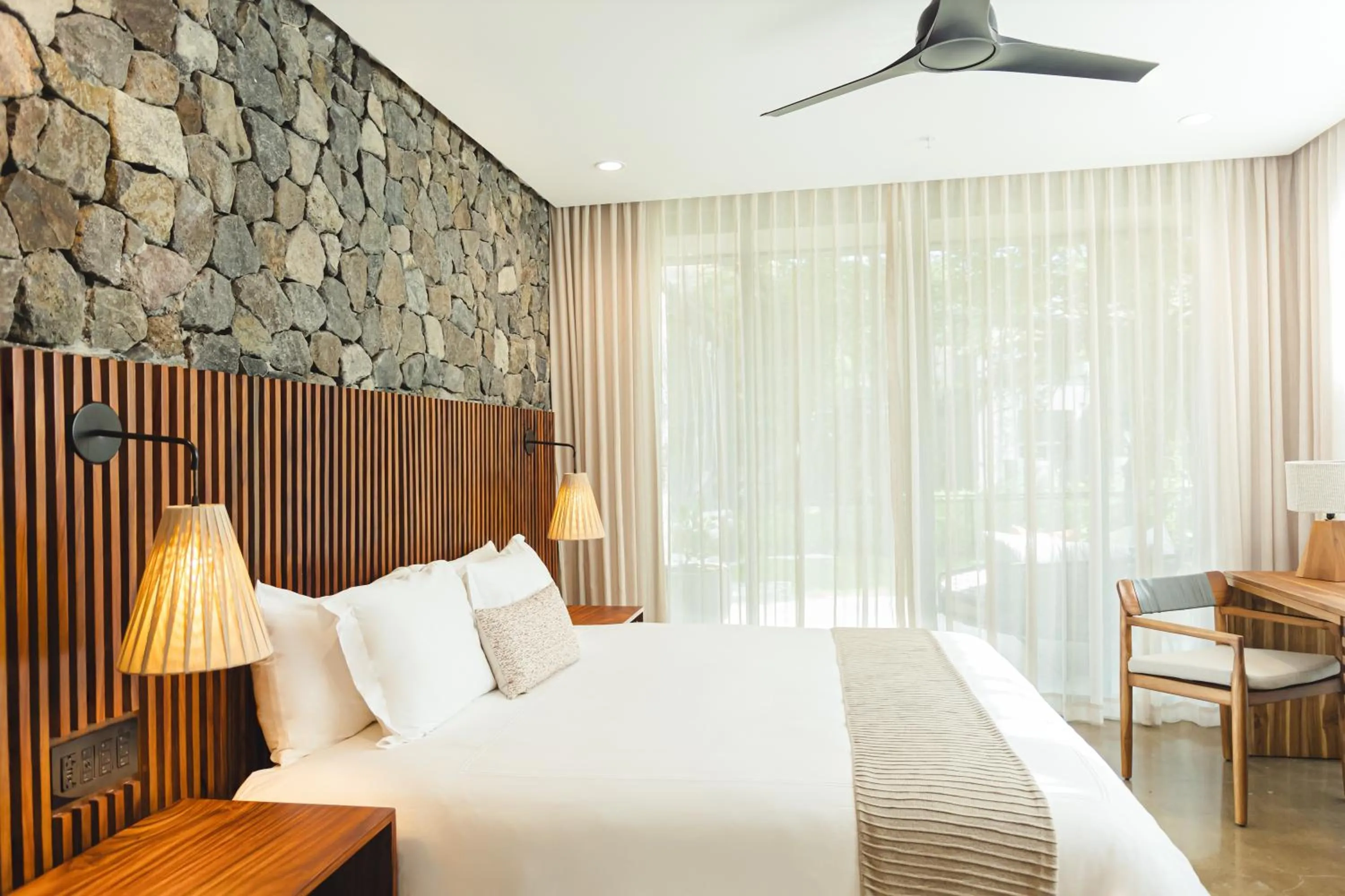 Bed in El Mangroove Papagayo, Autograph Collection