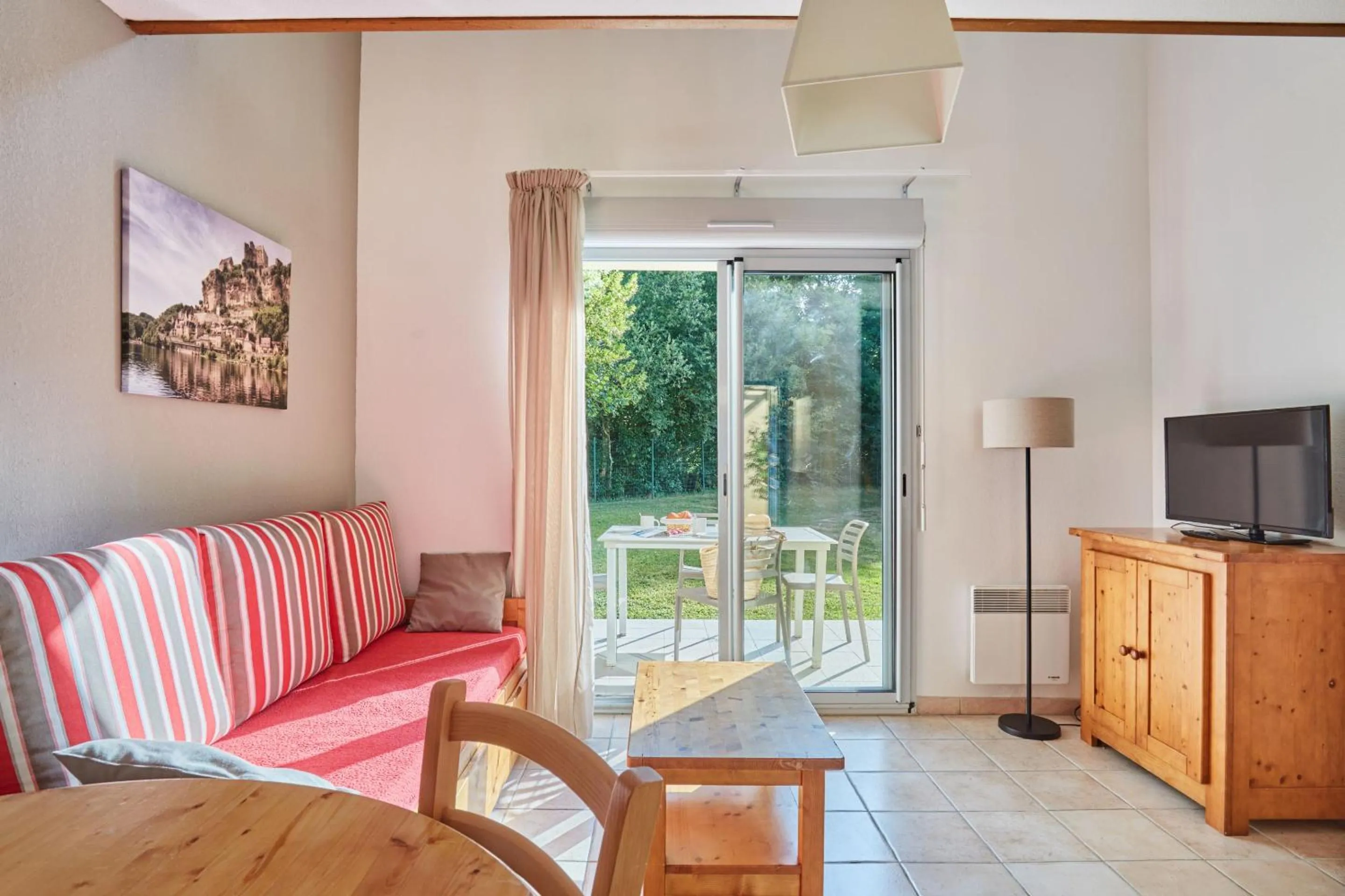 Seating area in Résidence Odalys Le Hameau du Moulin