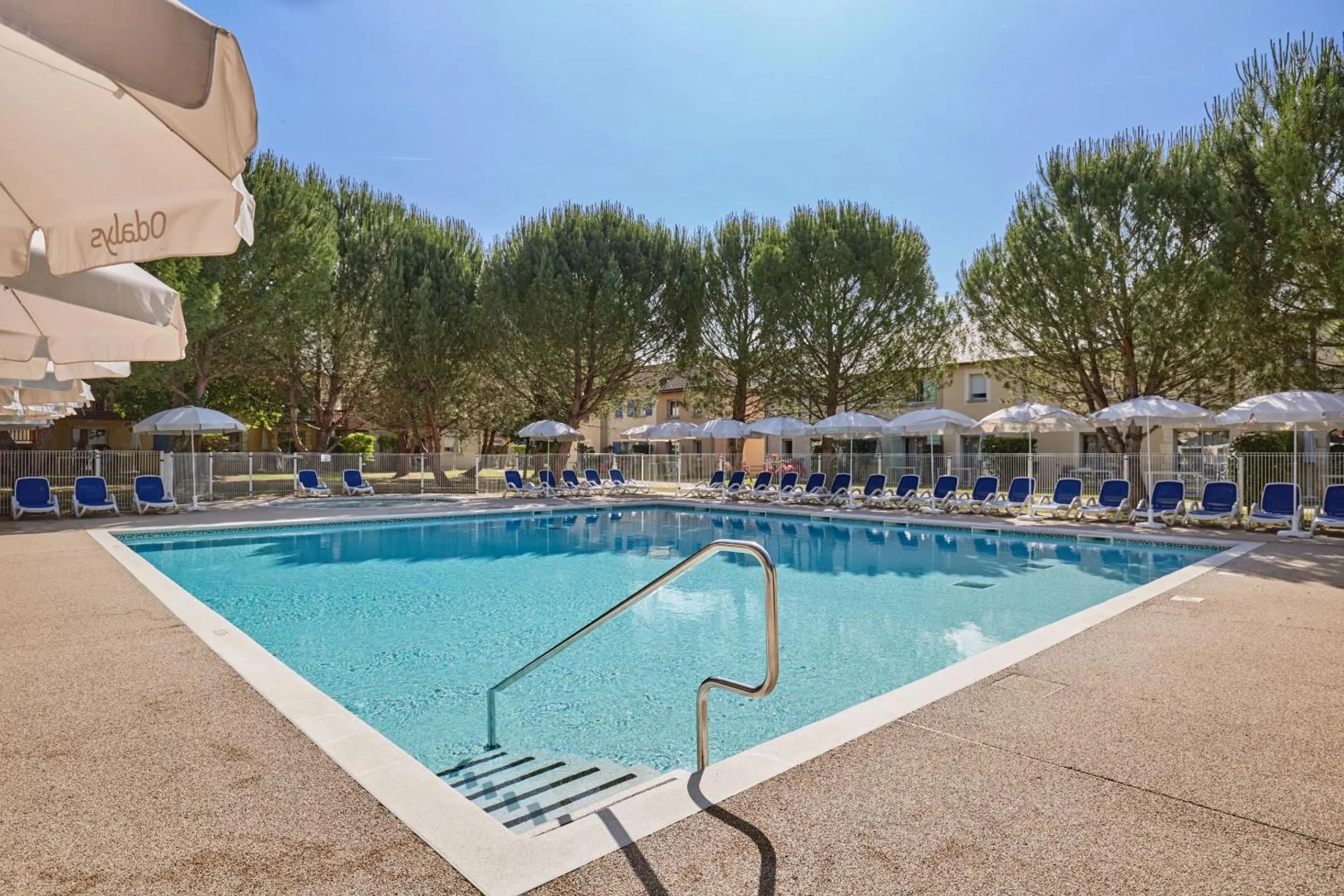 Swimming pool in Résidence Odalys Le Hameau du Moulin