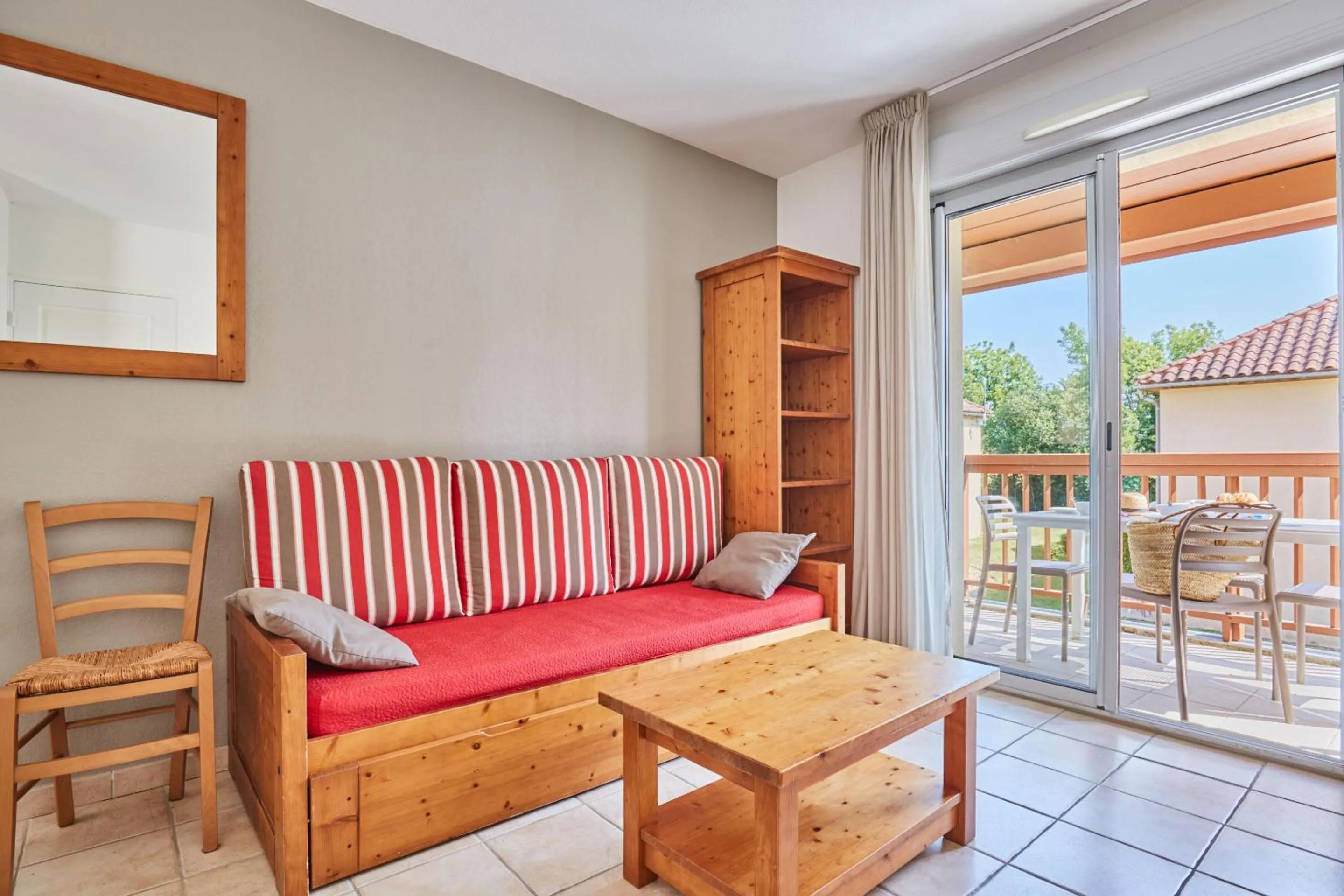 Seating area in Résidence Odalys Le Hameau du Moulin