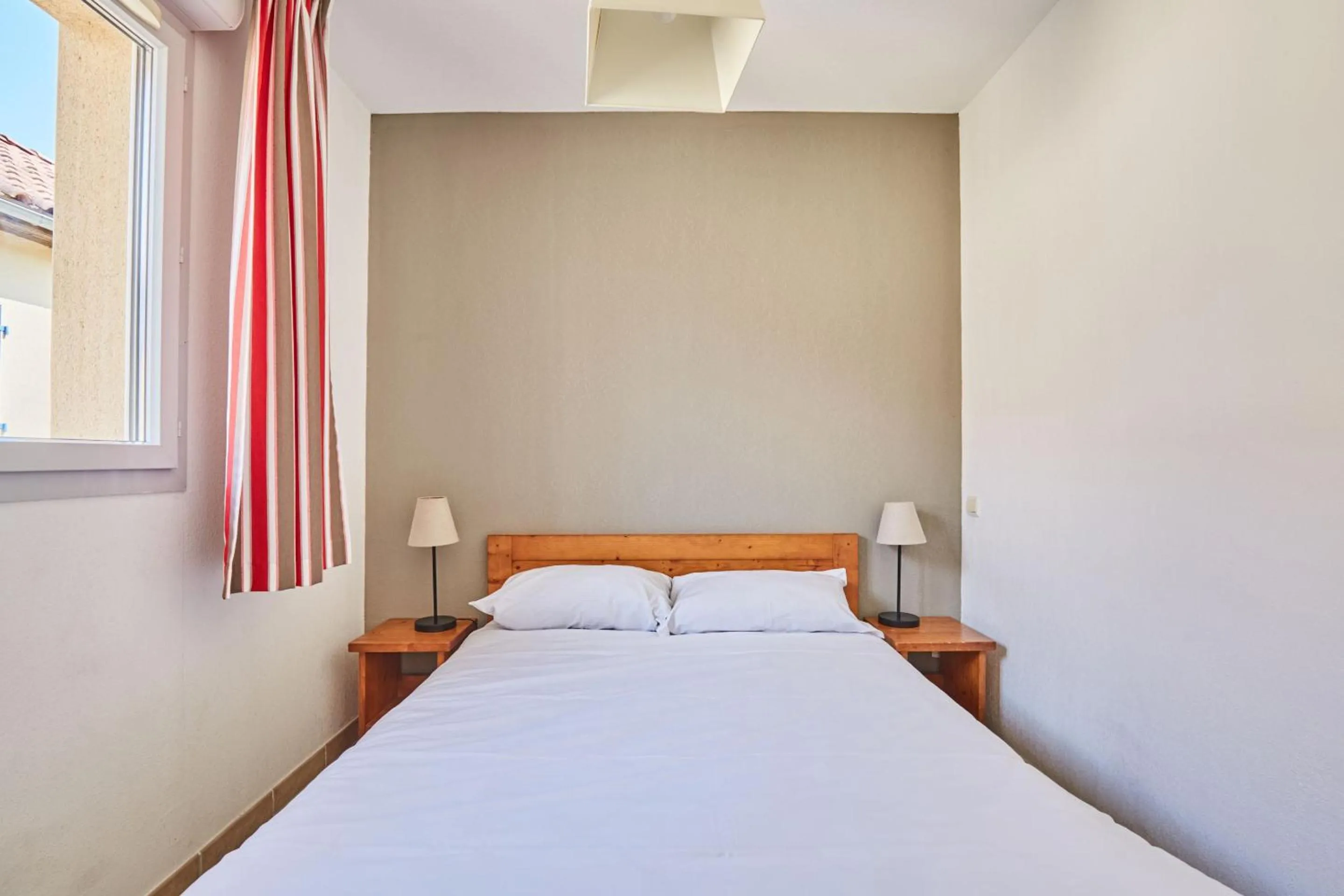 Bedroom, Bed in Résidence Odalys Le Hameau du Moulin