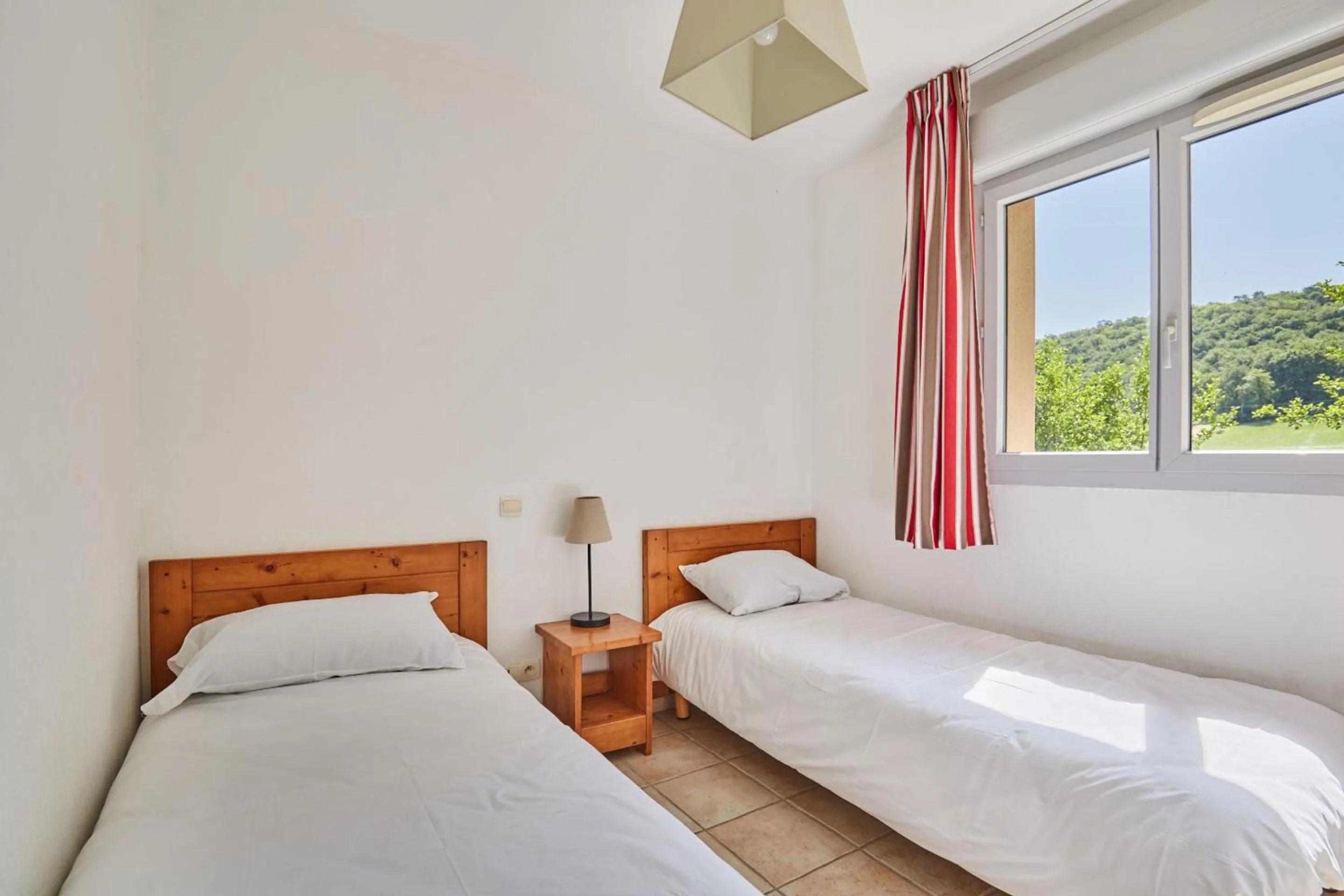 Bedroom, Bed in Résidence Odalys Le Hameau du Moulin