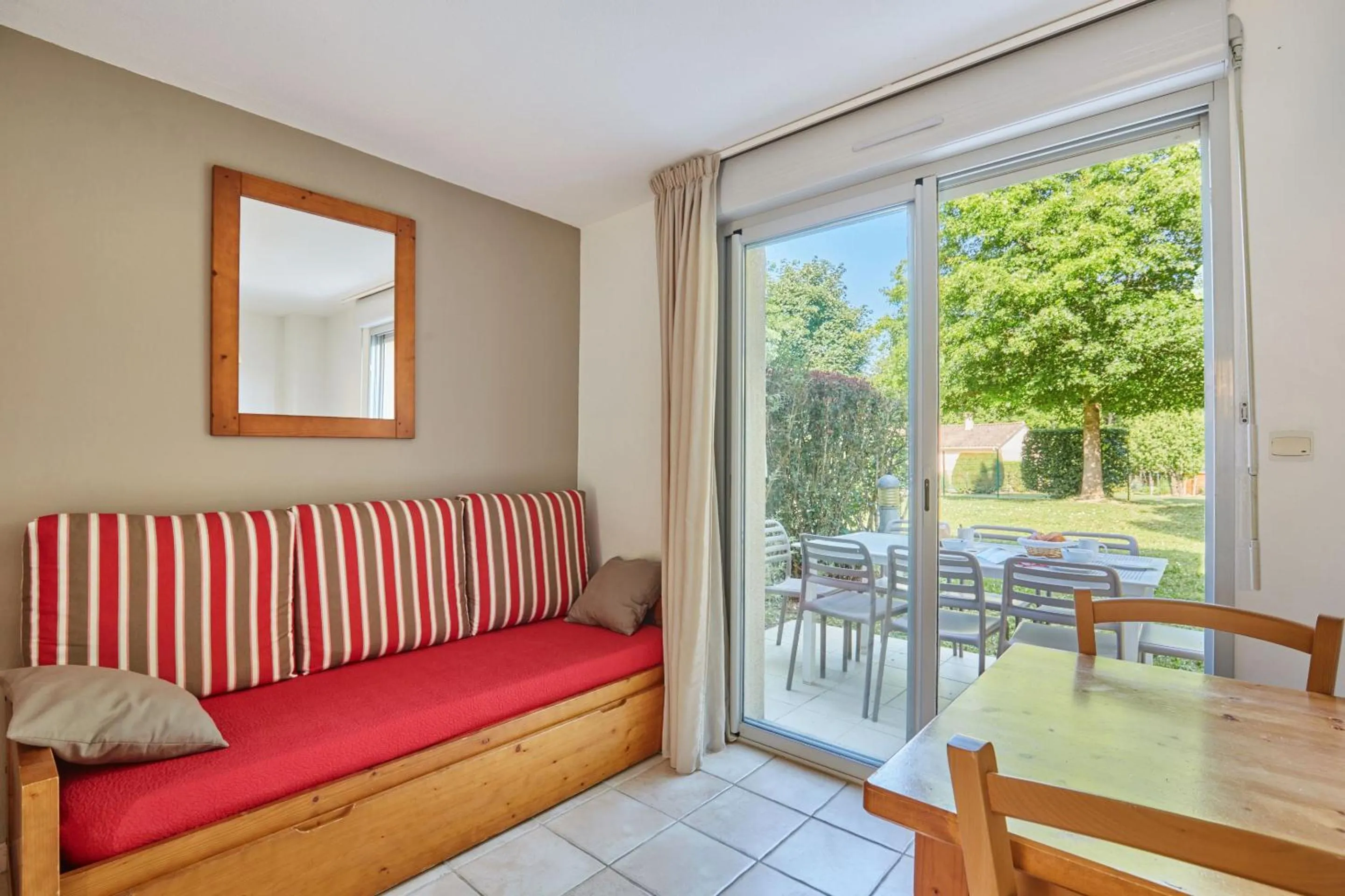 Seating area in Résidence Odalys Le Hameau du Moulin