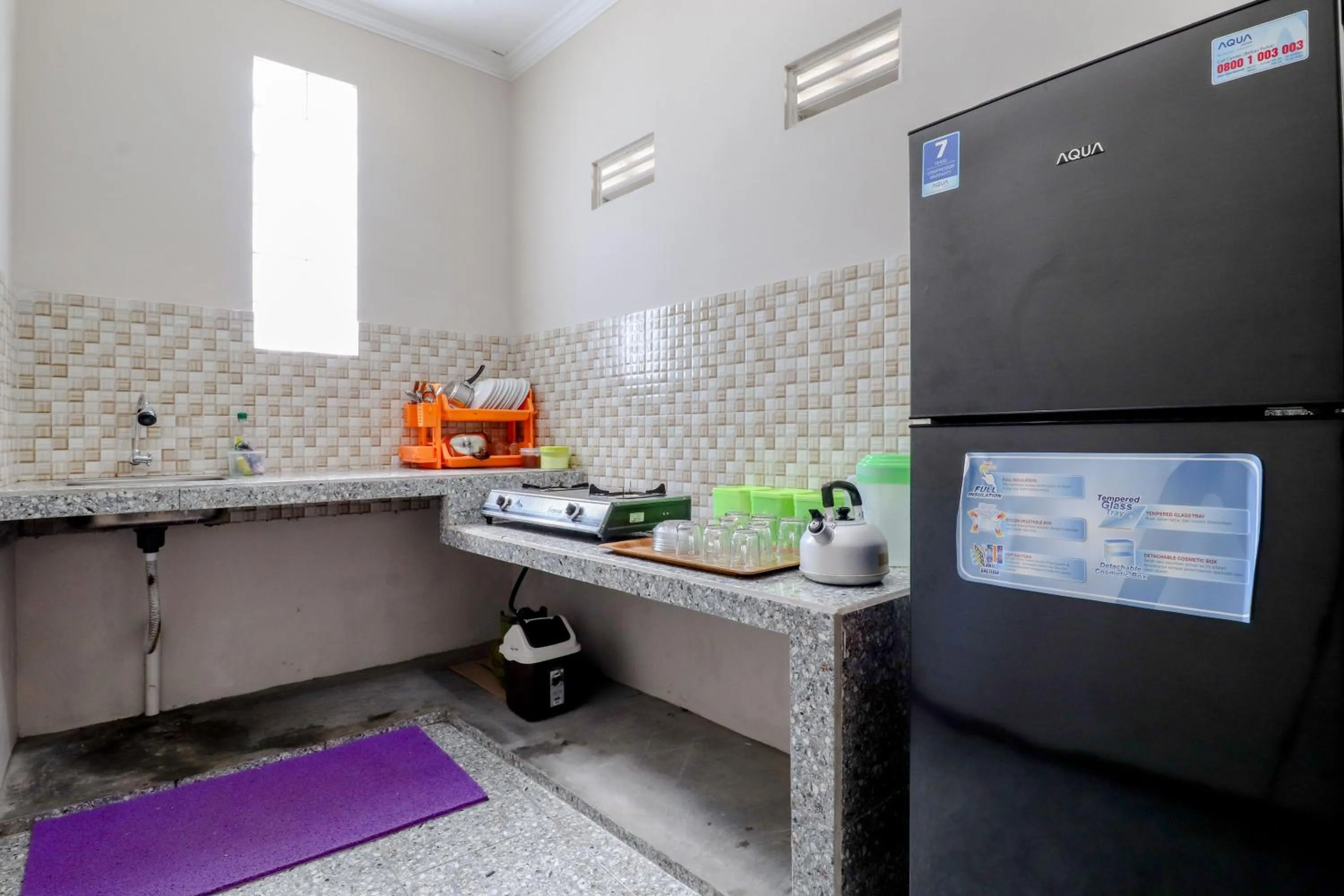 Kitchen or kitchenette in Guesthouse Nusa Indah Syariah 2