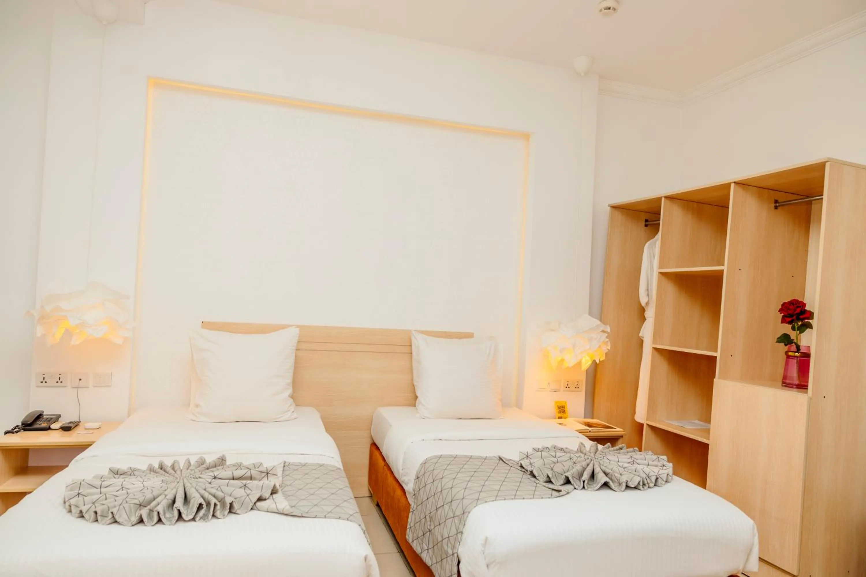 Bed in Amata n'Ubuki Boutique Hotel Ltd