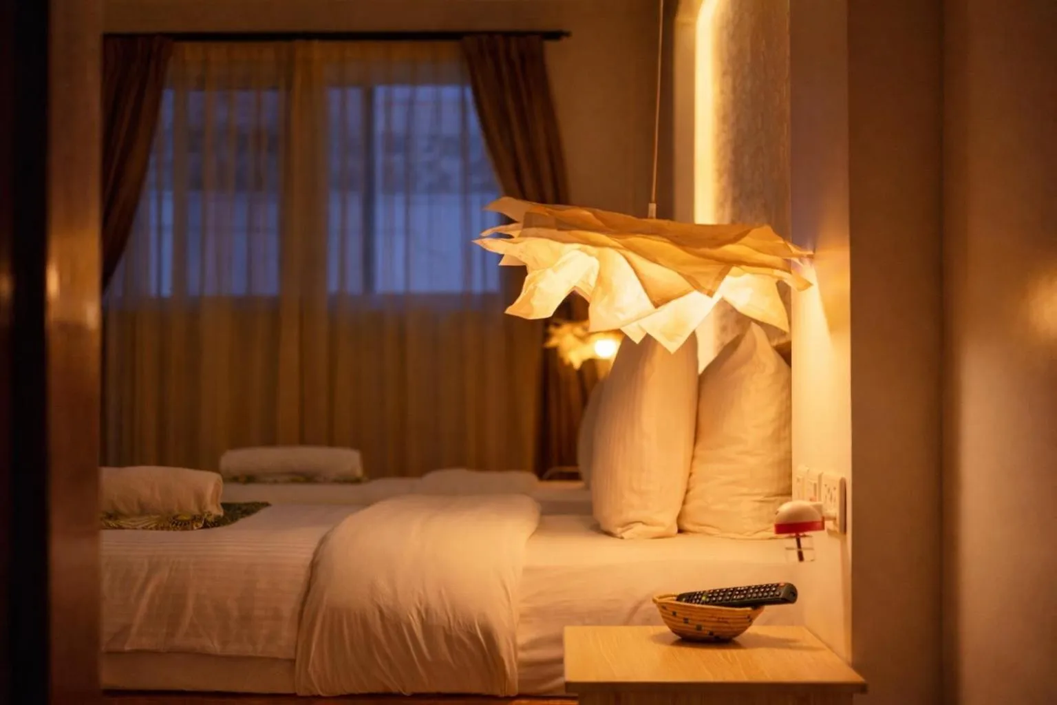 Bed in Amata n'Ubuki Boutique Hotel Ltd