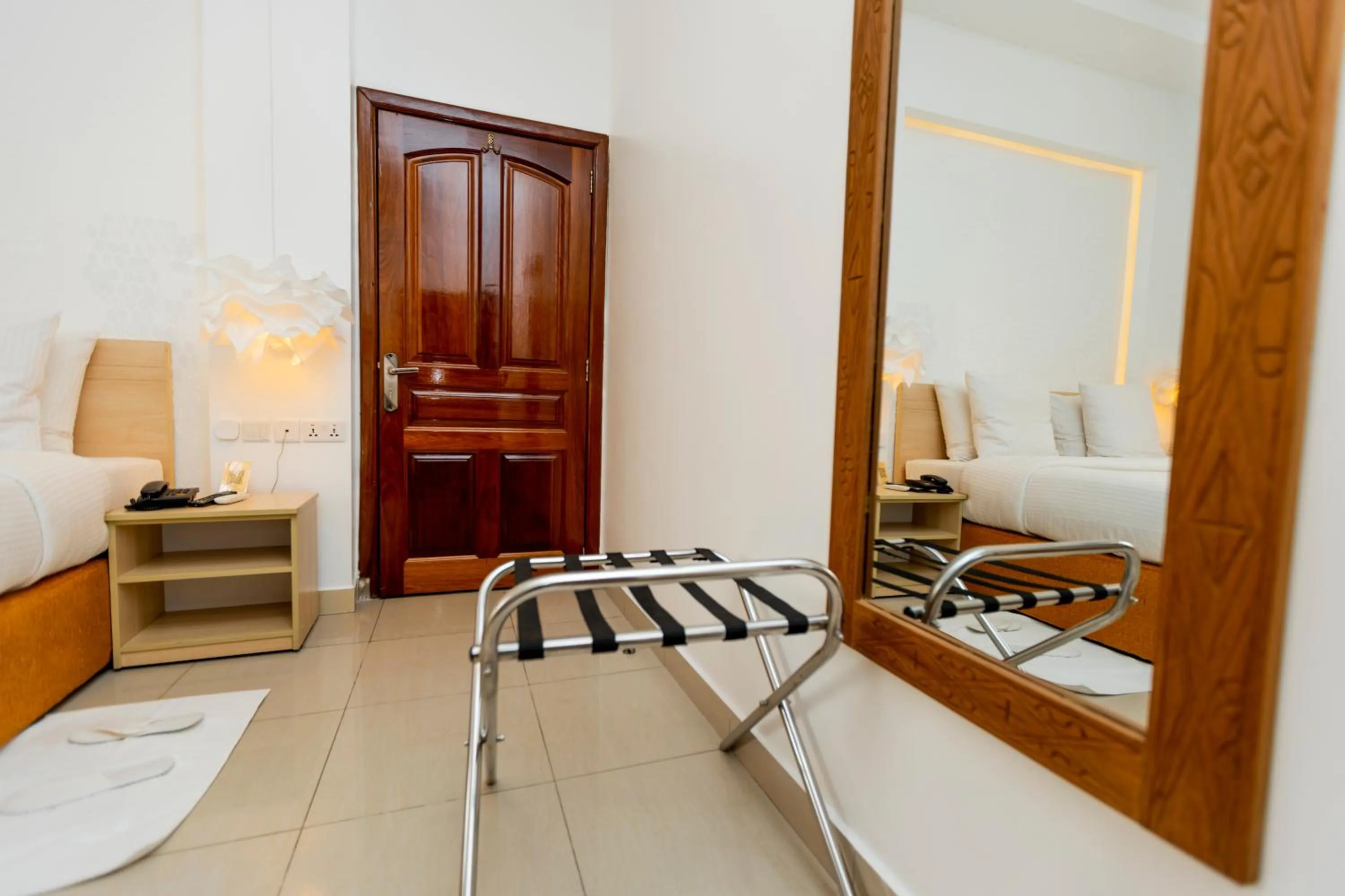 Bed in Amata n'Ubuki Boutique Hotel Ltd