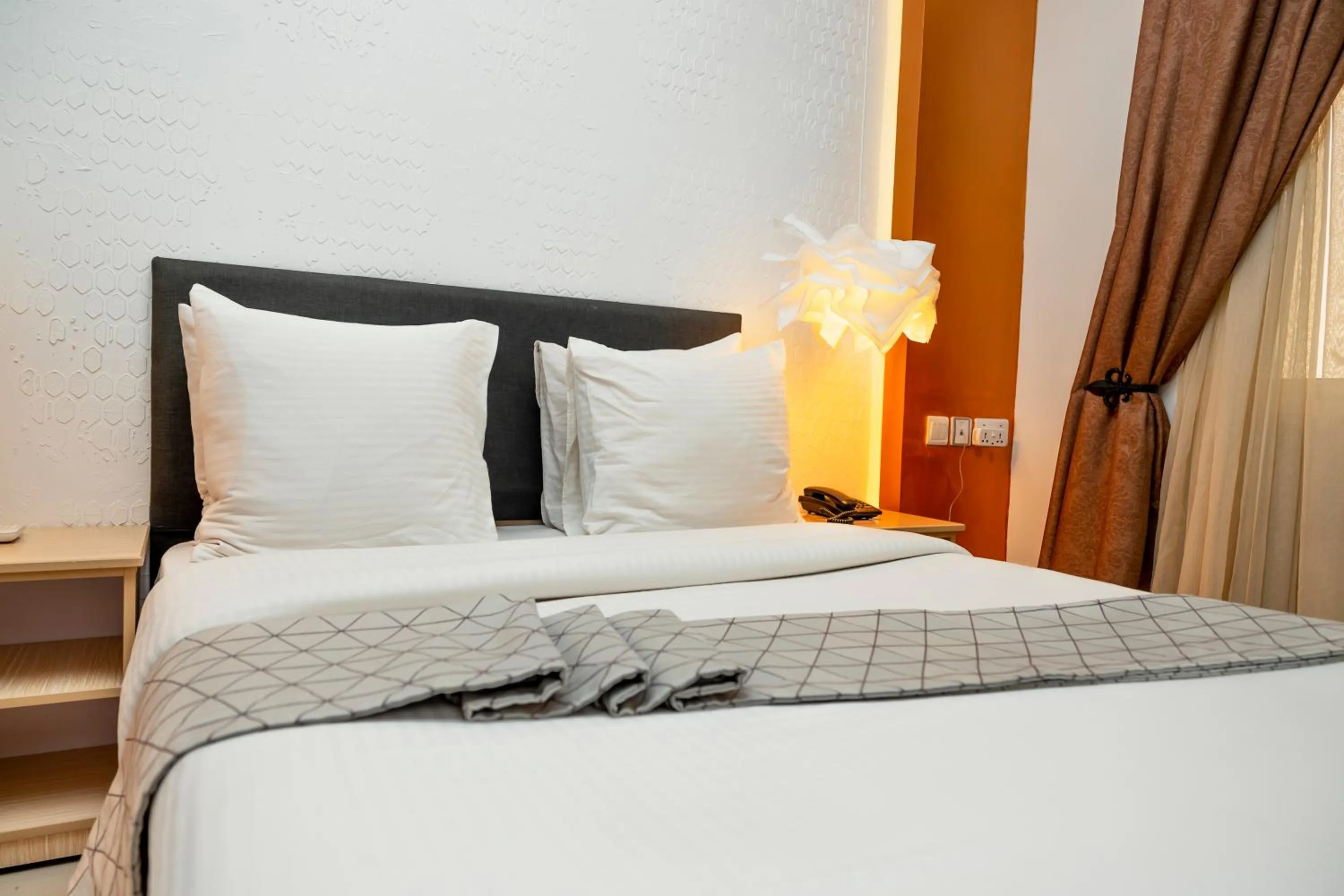 Bed in Amata n'Ubuki Boutique Hotel Ltd
